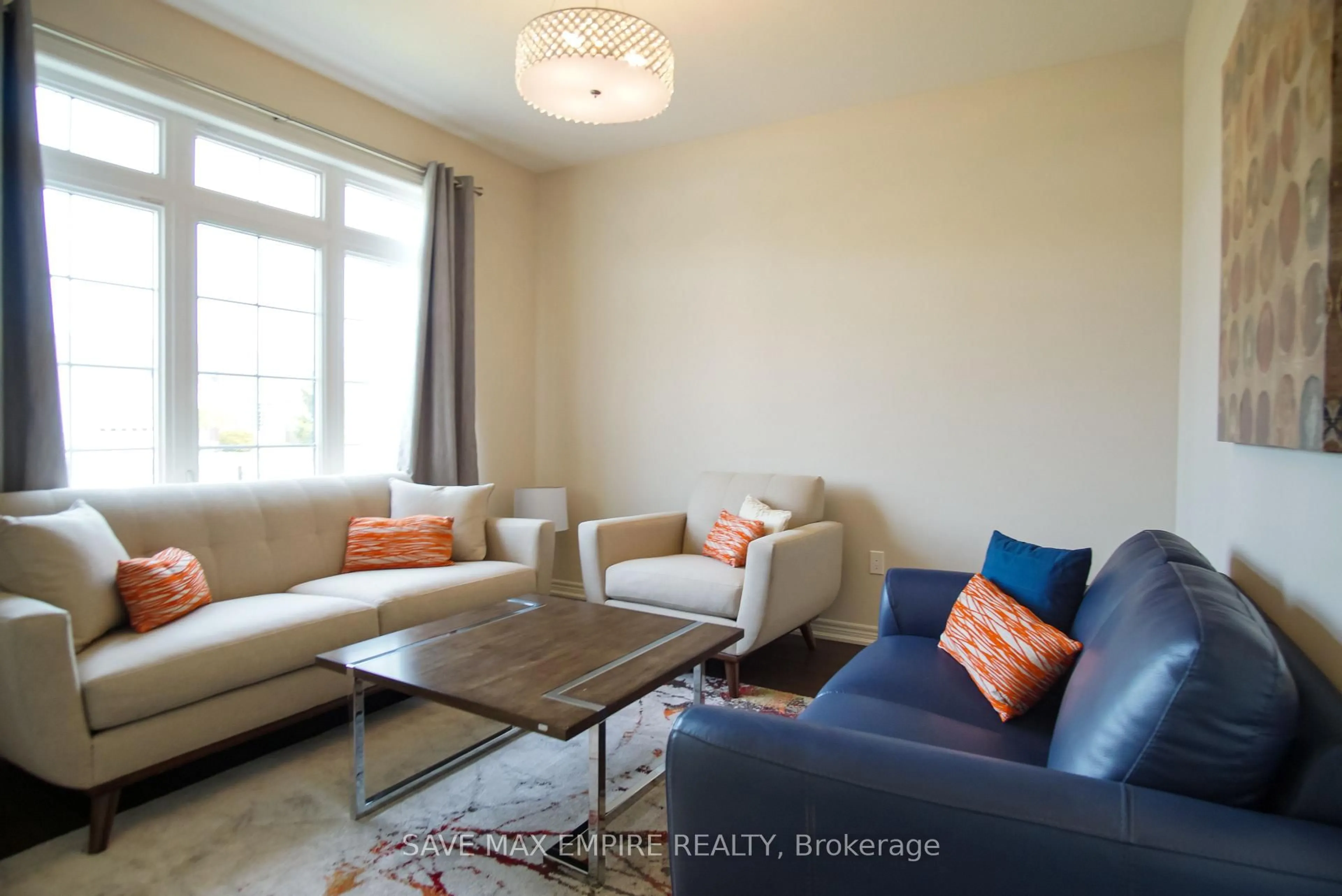 Living room with furniture, wood/laminate floor for 3423 DOMINION Rd, Fort Erie Ontario L0S 1N0