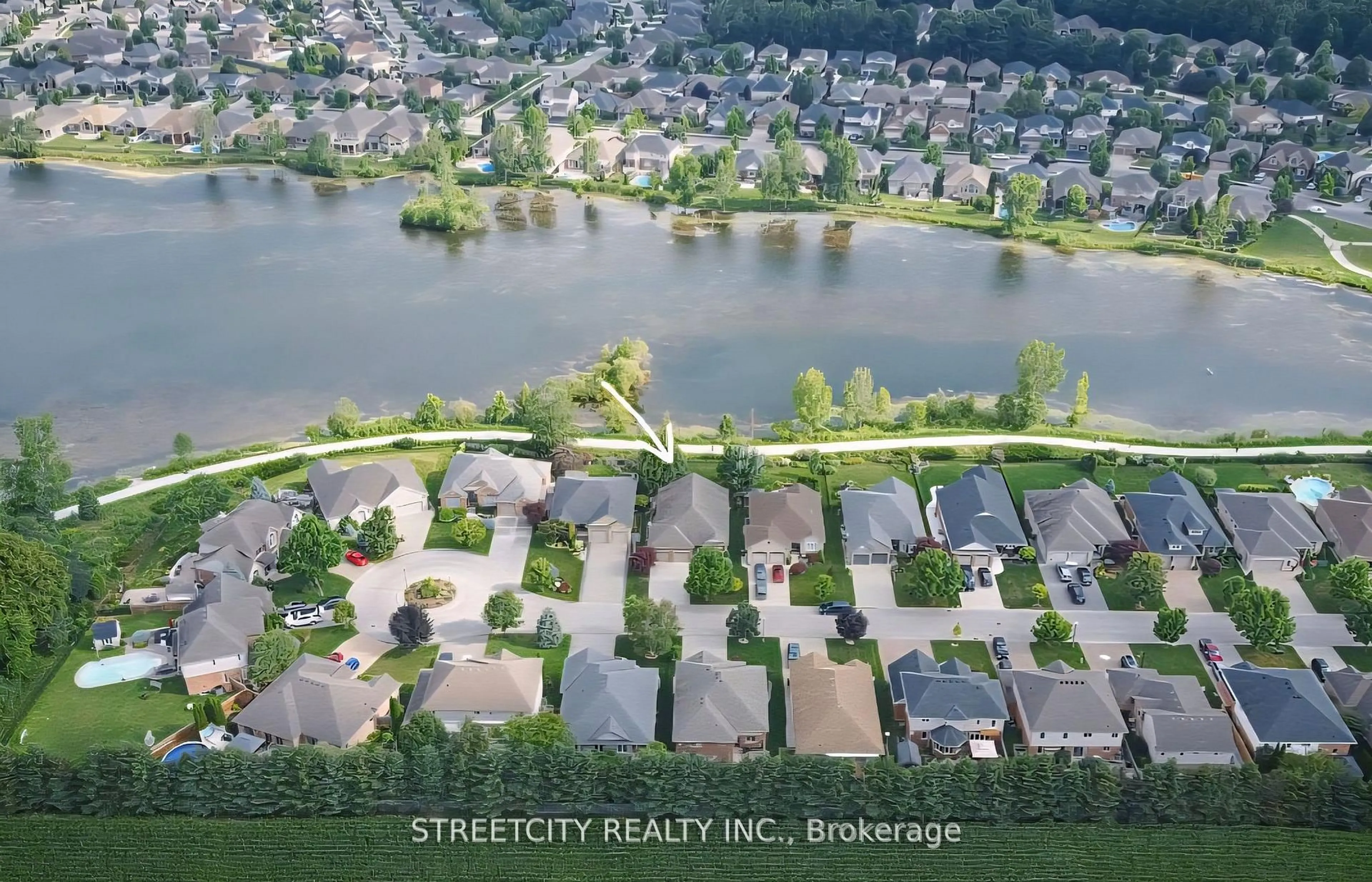 A pic from outside/outdoor area/front of a property/back of a property/a pic from drone, water/lake/river/ocean view for 21 Beechwood Circ, St. Thomas Ontario N5R 6K4