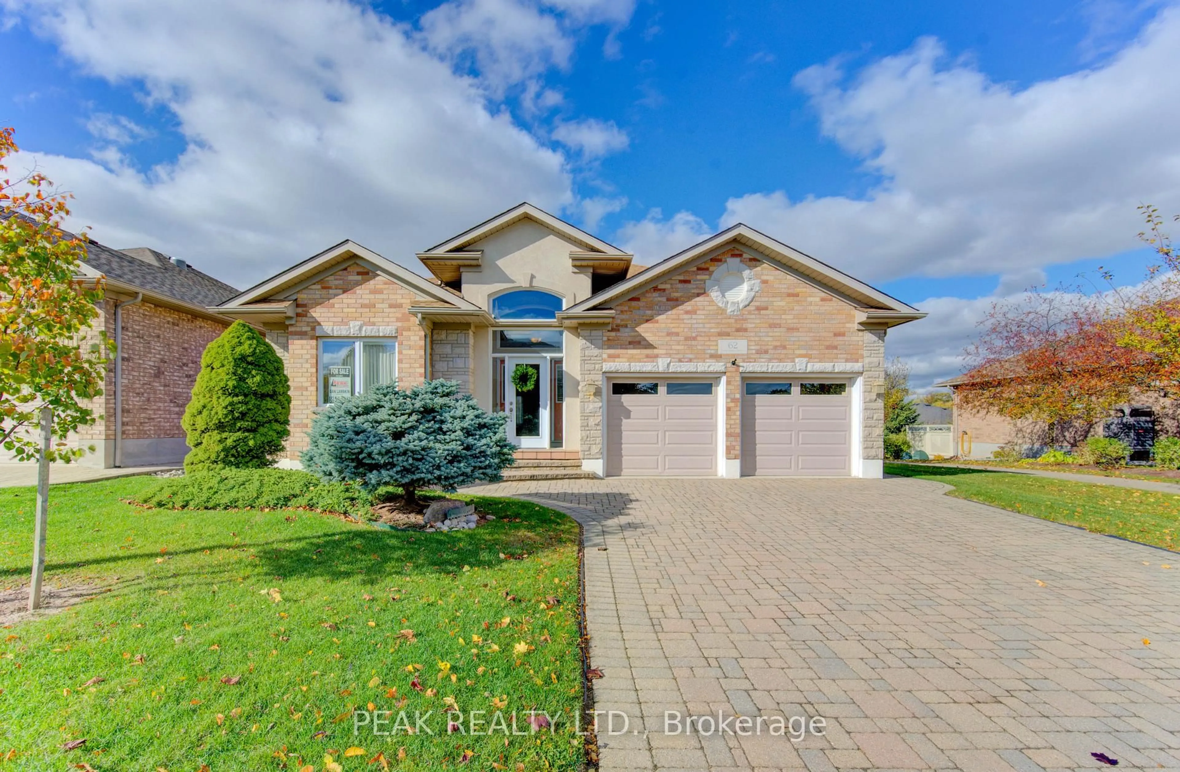 Home with brick exterior material, street for 62 Thimbleberry Cross, Wilmot Ontario N3A 4P5