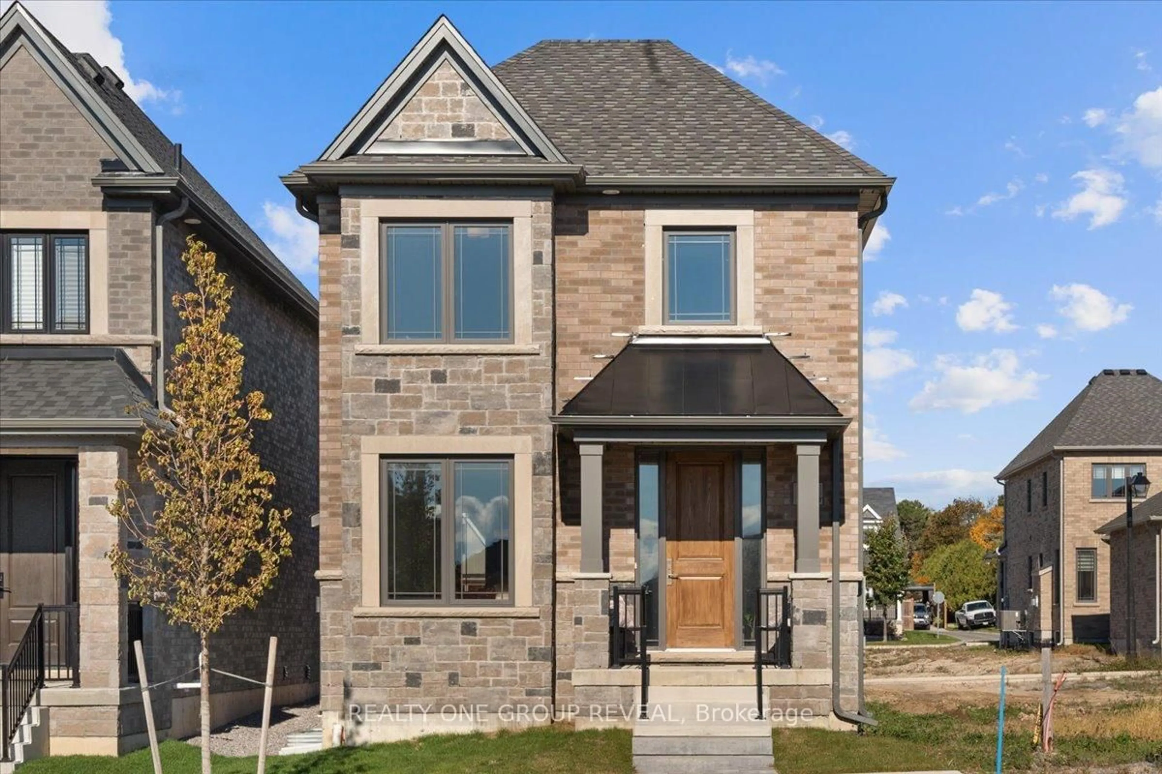 Home with brick exterior material, street for 12 Harrigan St, Port Hope Ontario L1A 0G6