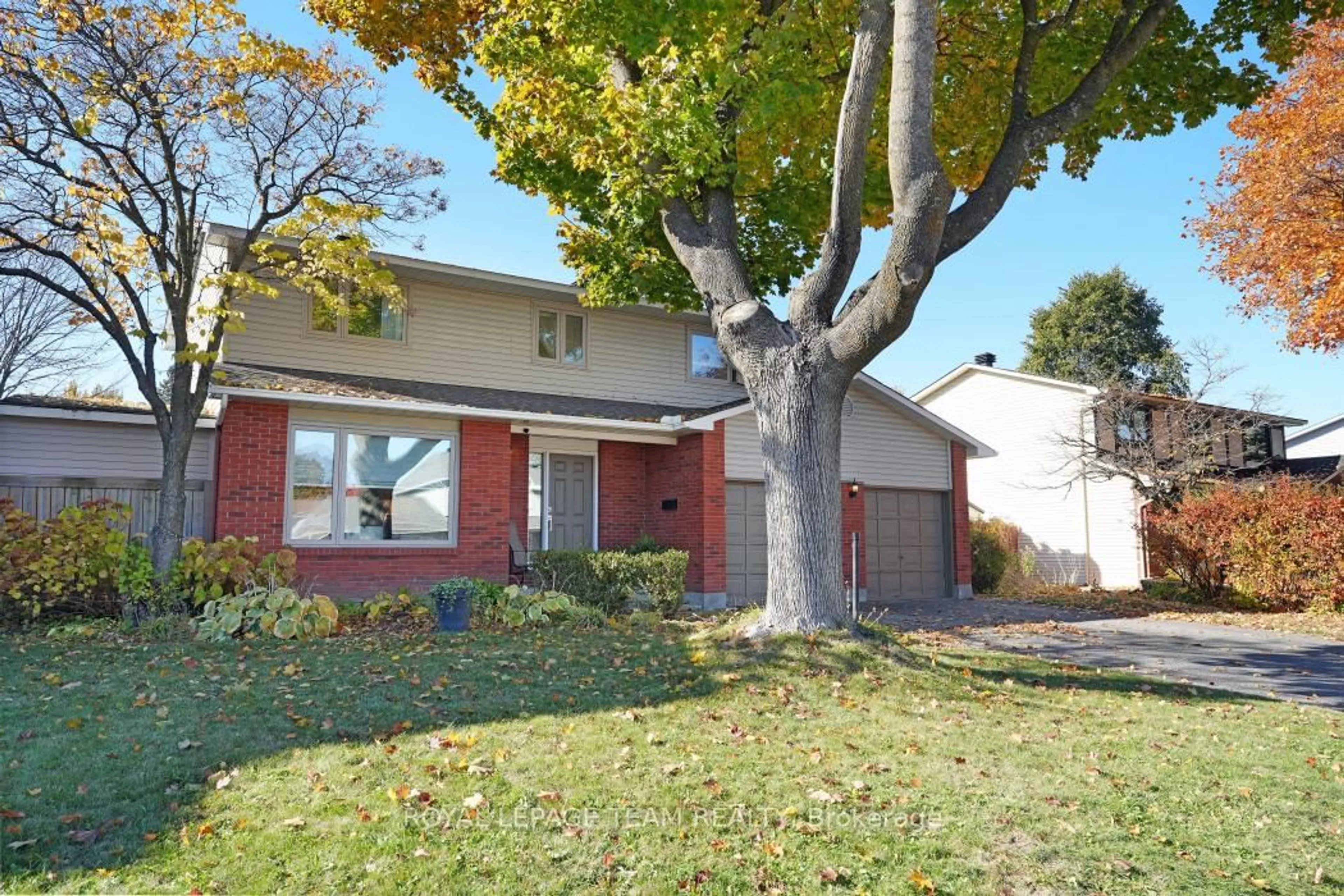 Home with brick exterior material, street for 28 Holitman Dr, Barrhaven Ontario K2J 2A9