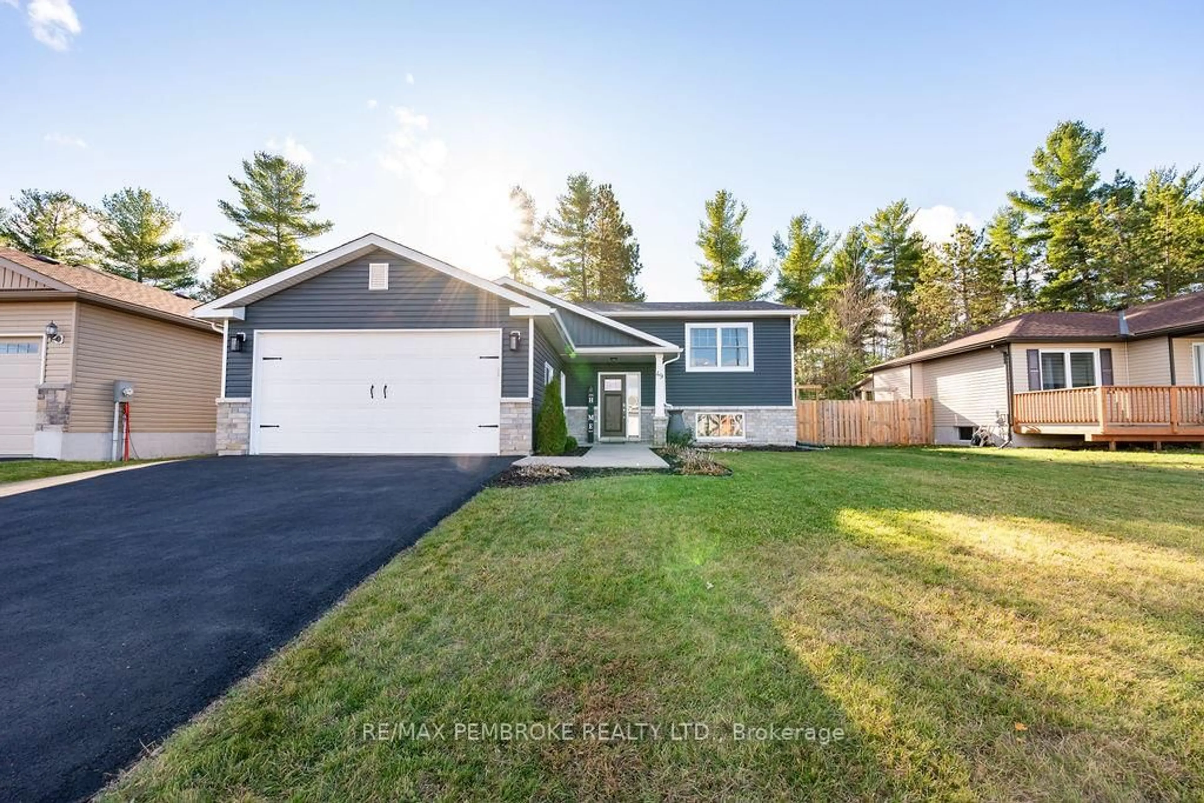 Home with vinyl exterior material, street for 49 Dustin Dr, Petawawa Ontario K8H 0G3