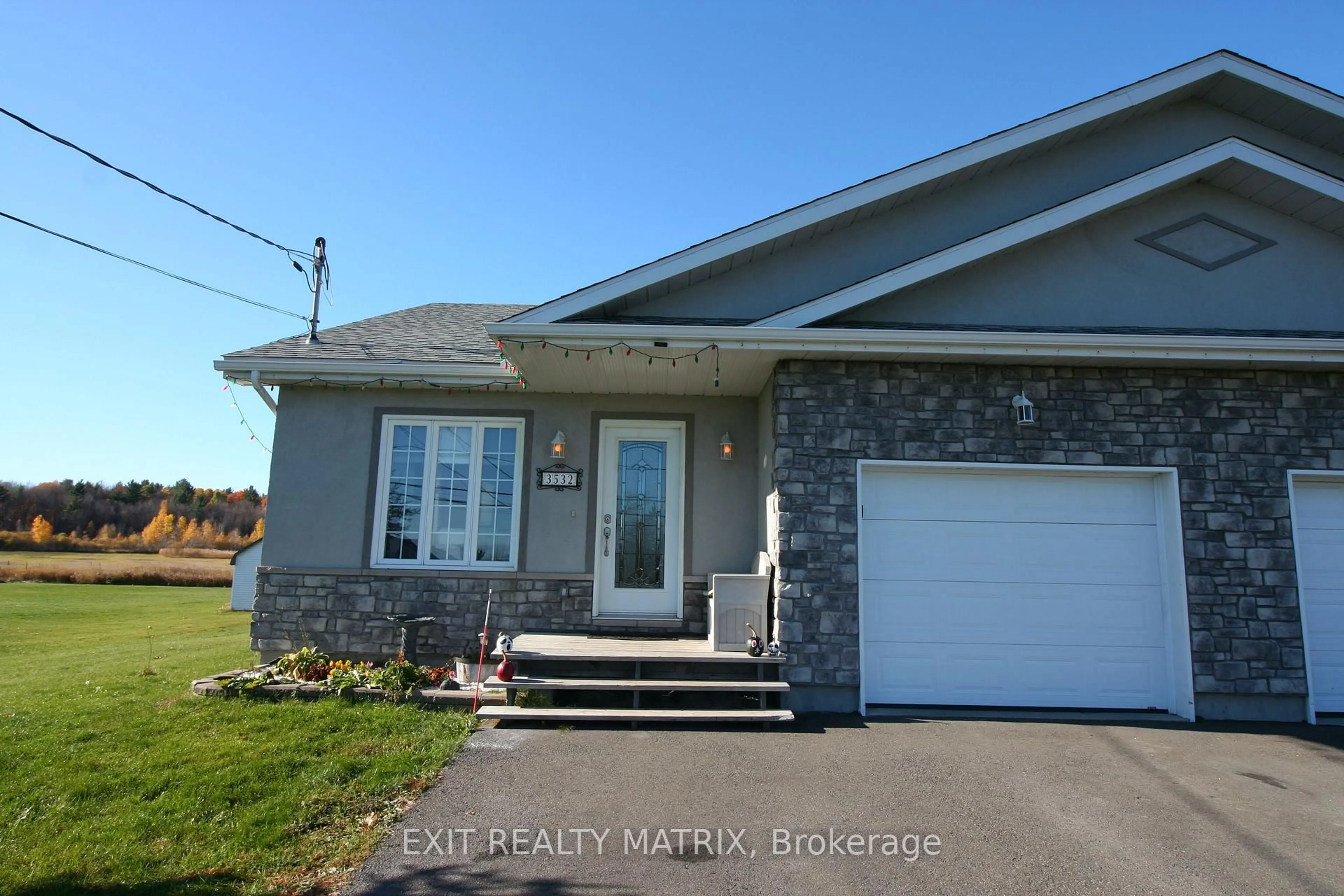 Home with vinyl exterior material, street for 3532-3534 Front Rd, East Hawkesbury Ontario K6A 2R2