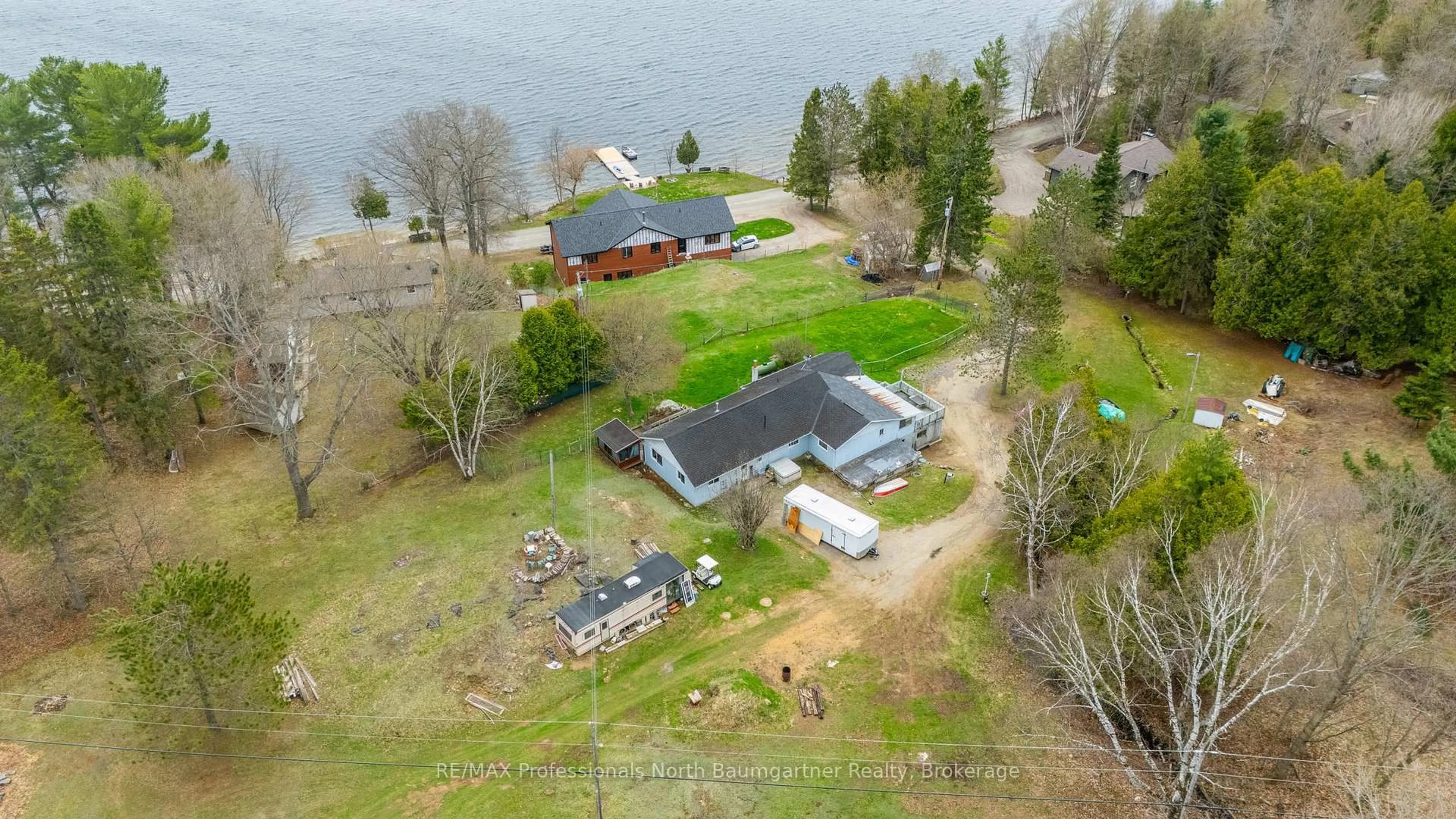 A pic from outside/outdoor area/front of a property/back of a property/a pic from drone, water/lake/river/ocean view for 1093 Reynolds Rd, Minden Hills Ontario K0M 2K0