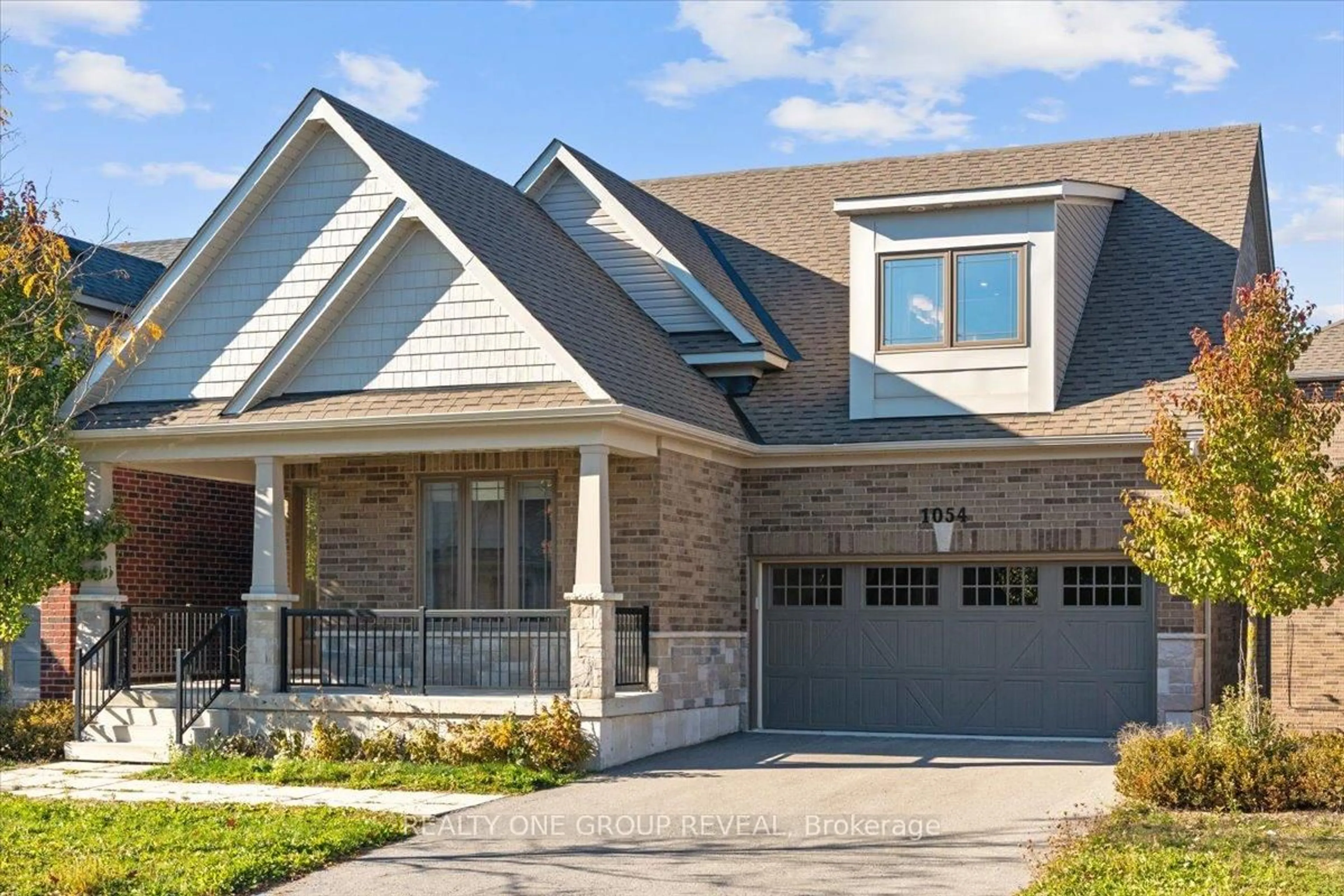 Home with brick exterior material, street for 1054 Rippingale Tr, Peterborough Ontario K9H 0J8