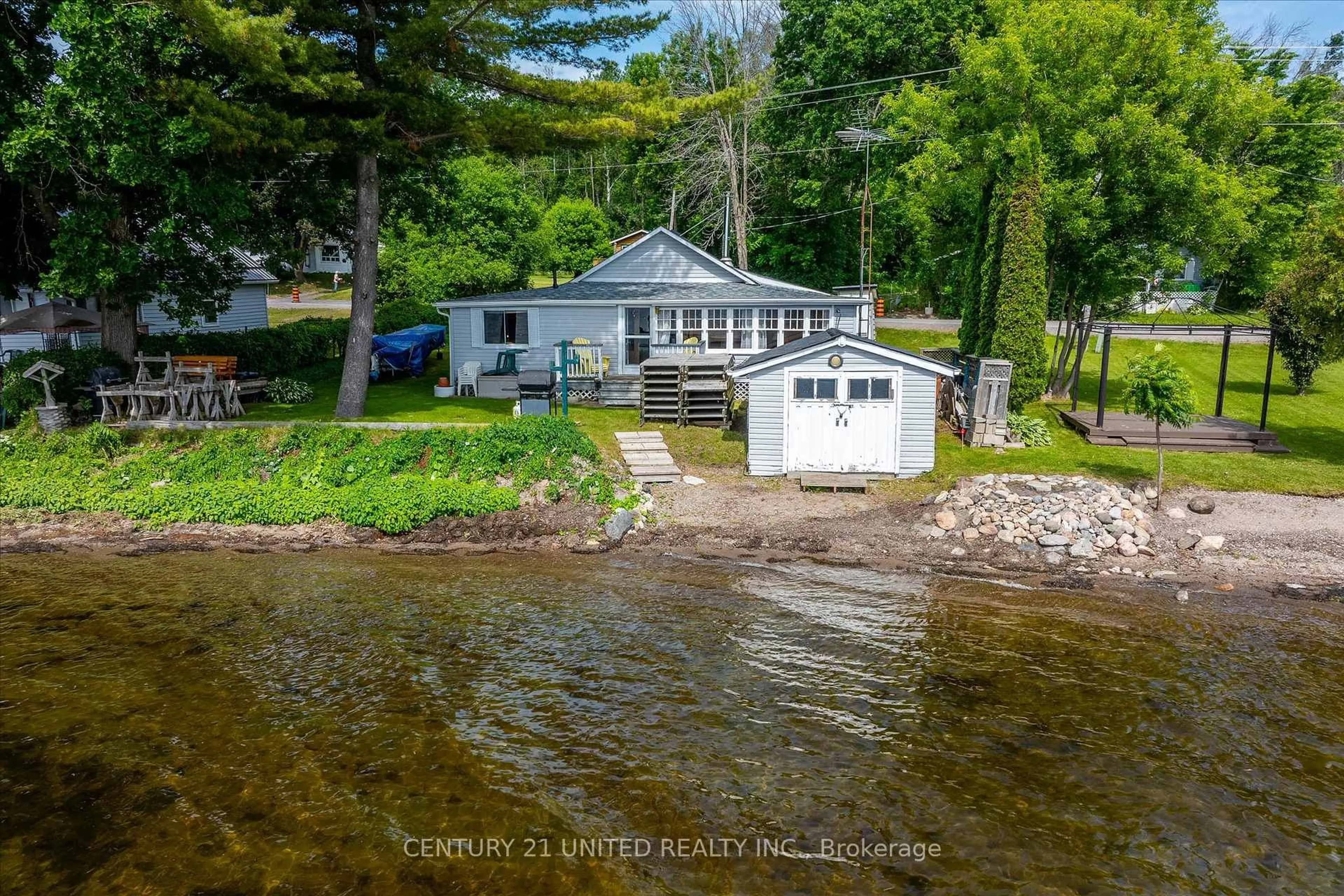 A pic from outside/outdoor area/front of a property/back of a property/a pic from drone, water/lake/river/ocean view for 221 Paudash St, Hiawatha First Nation Ontario K0L 2G0