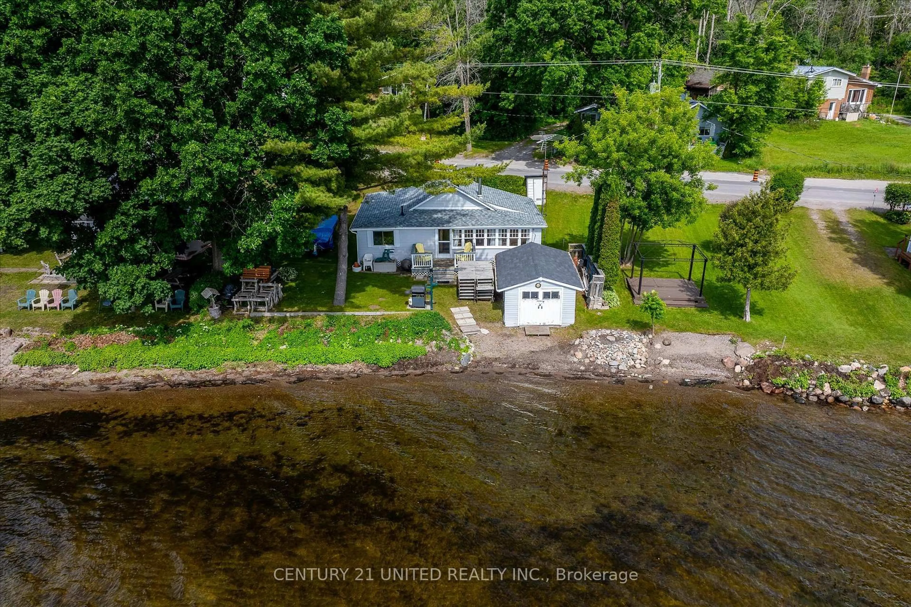 A pic from outside/outdoor area/front of a property/back of a property/a pic from drone, water/lake/river/ocean view for 221 Paudash St, Hiawatha First Nation Ontario K0L 2G0