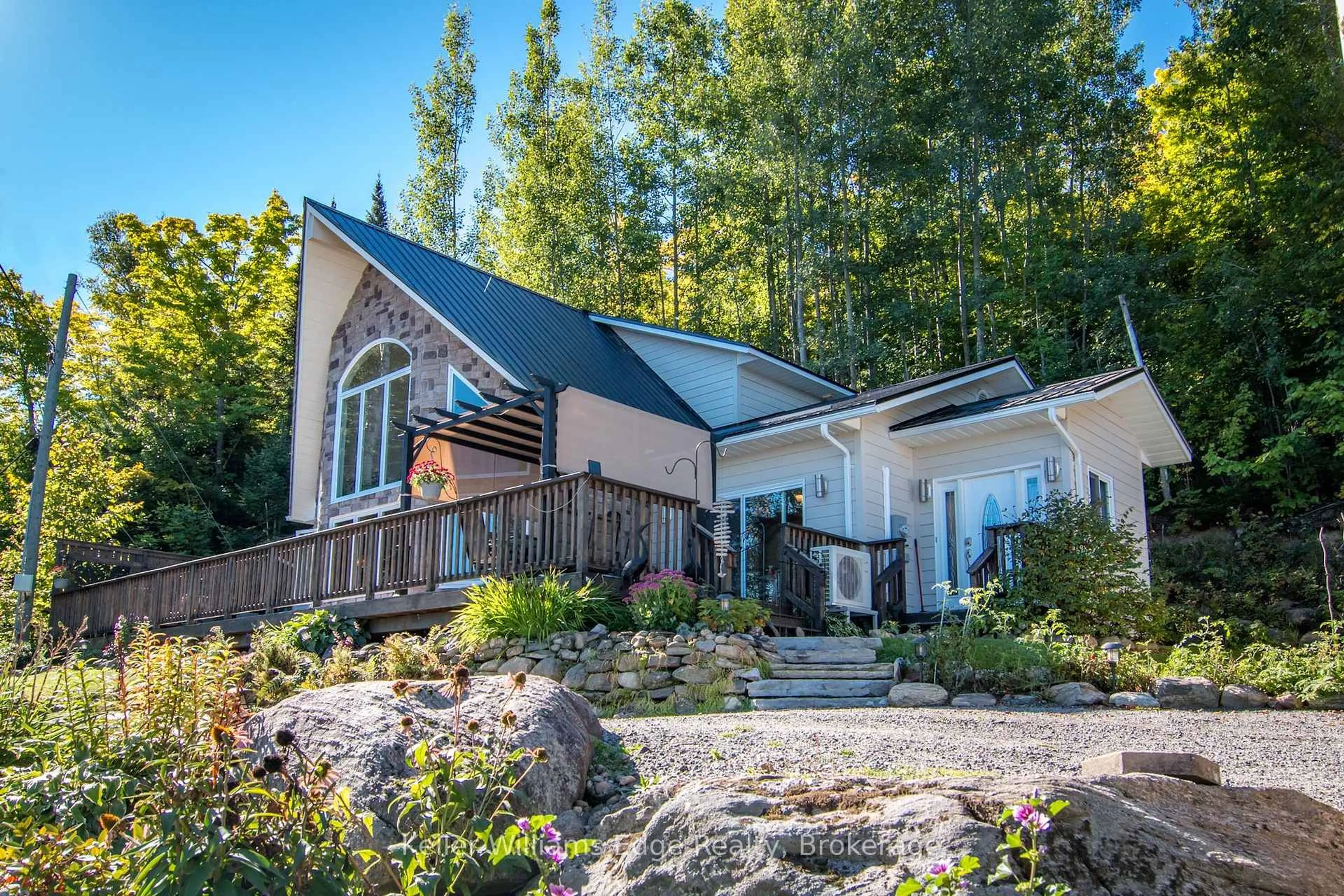 Home with vinyl exterior material, mountain view for 43 LAKESHORE Dr, Combermere Ontario K0J 1L0