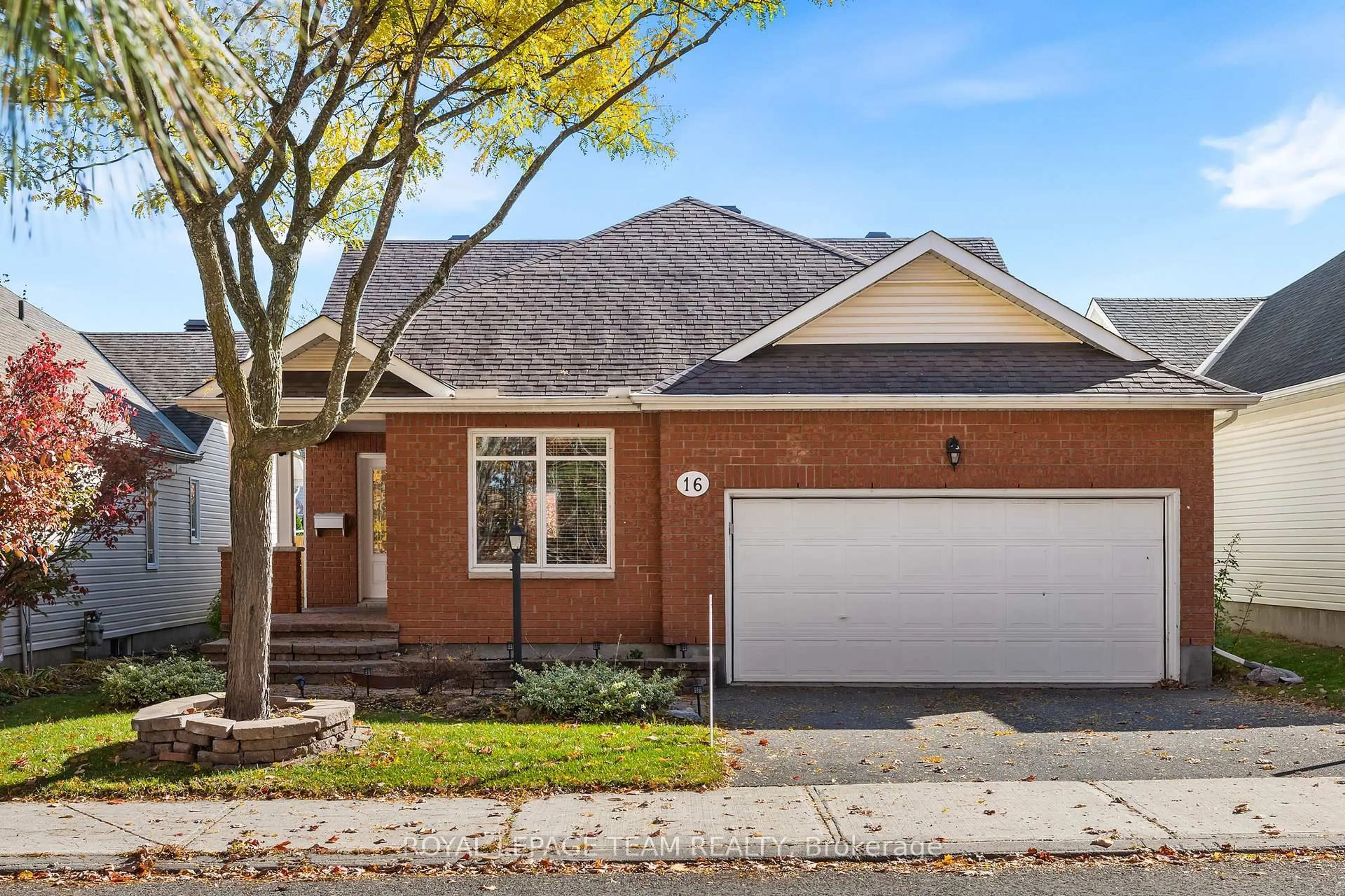 Home with brick exterior material, street for 16 Spinney Way, Ottawa Ontario K2J 4Y8
