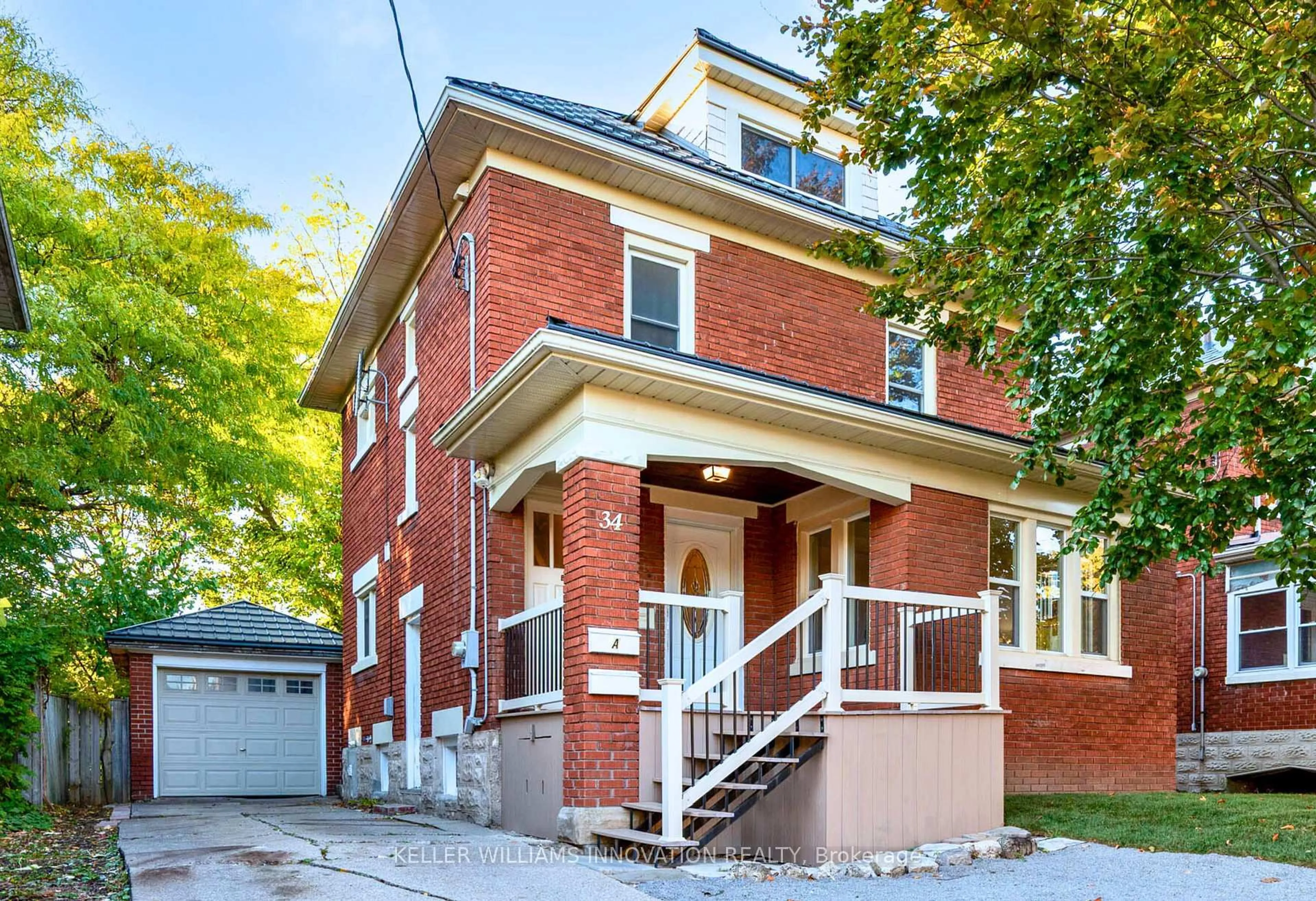 Home with brick exterior material, street for 34 Stirling Ave, Kitchener Ontario N2H 3G5
