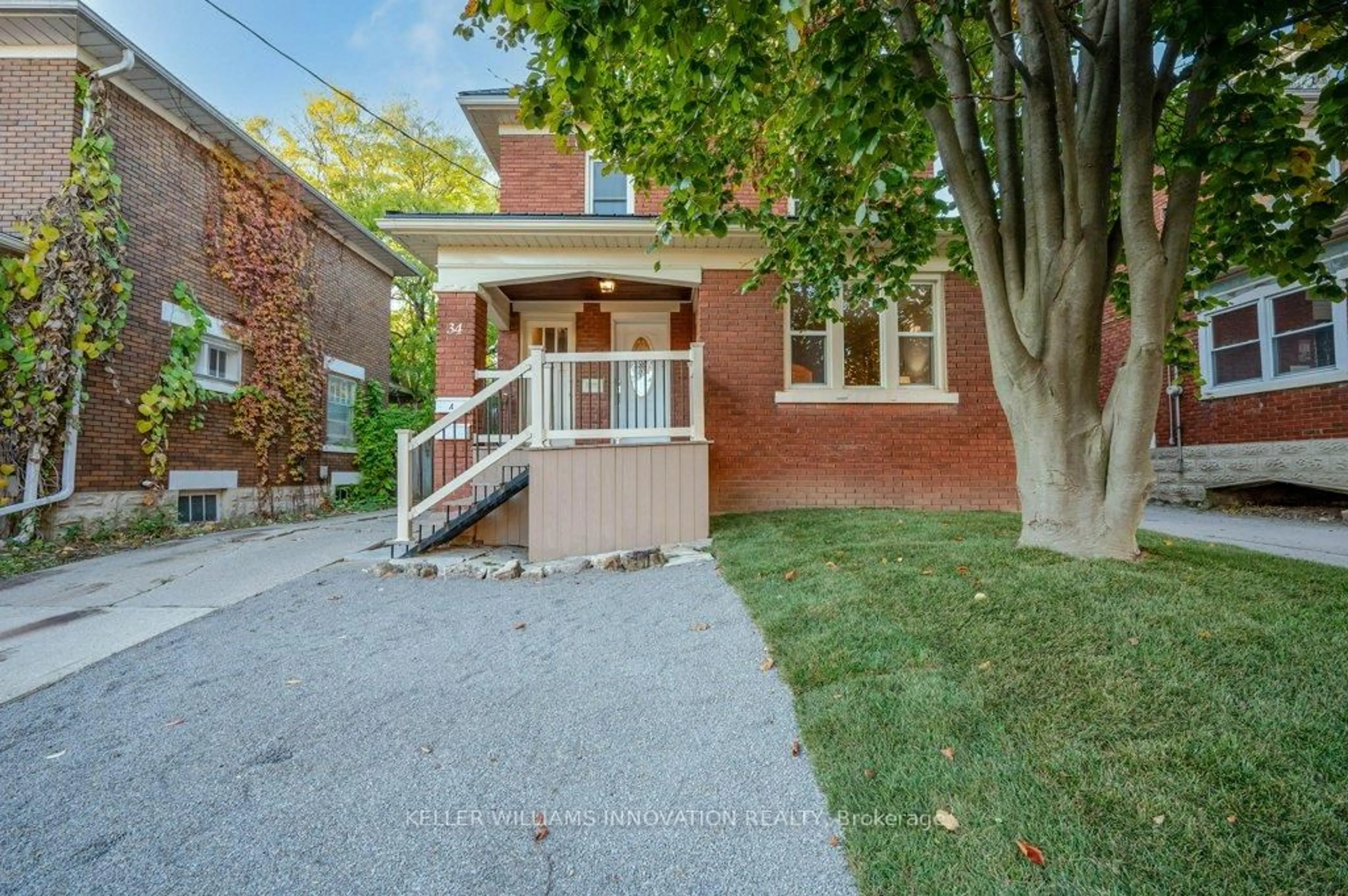 Home with brick exterior material, street for 34 Stirling Ave, Kitchener Ontario N2H 3G5