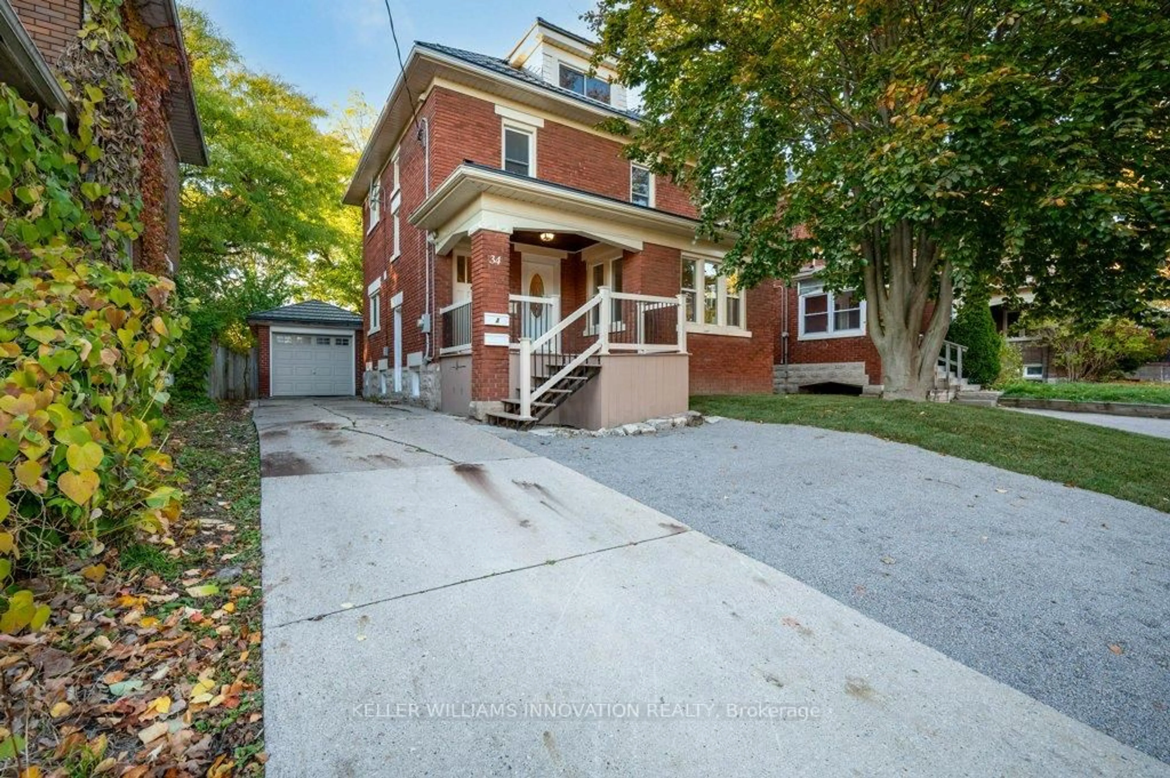 Home with brick exterior material, street for 34 Stirling Ave, Kitchener Ontario N2H 3G5