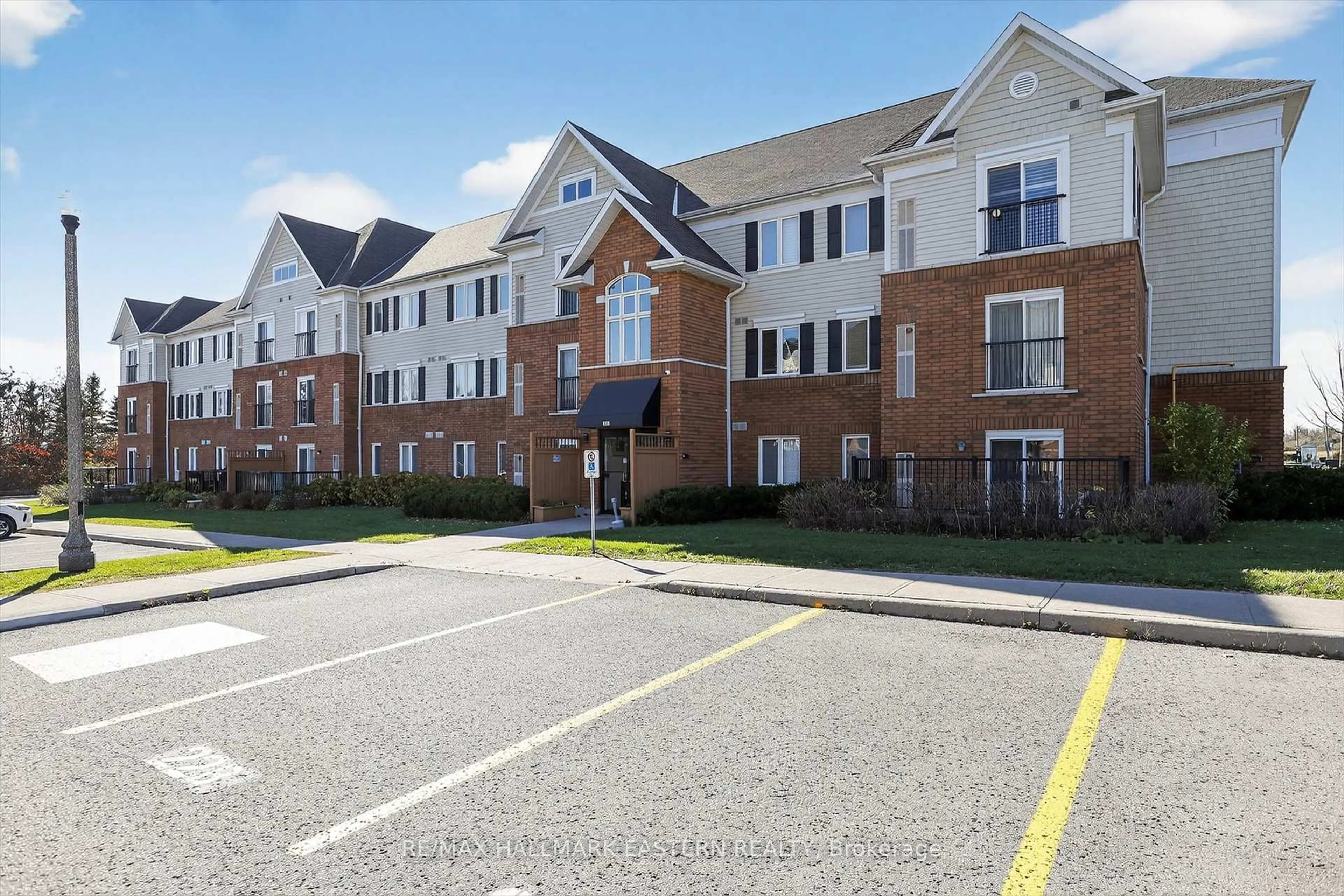 A pic from outside/outdoor area/front of a property/back of a property/a pic from drone, street for 306 Spillsbury Dr ##309, Peterborough Ontario K9K 0B5