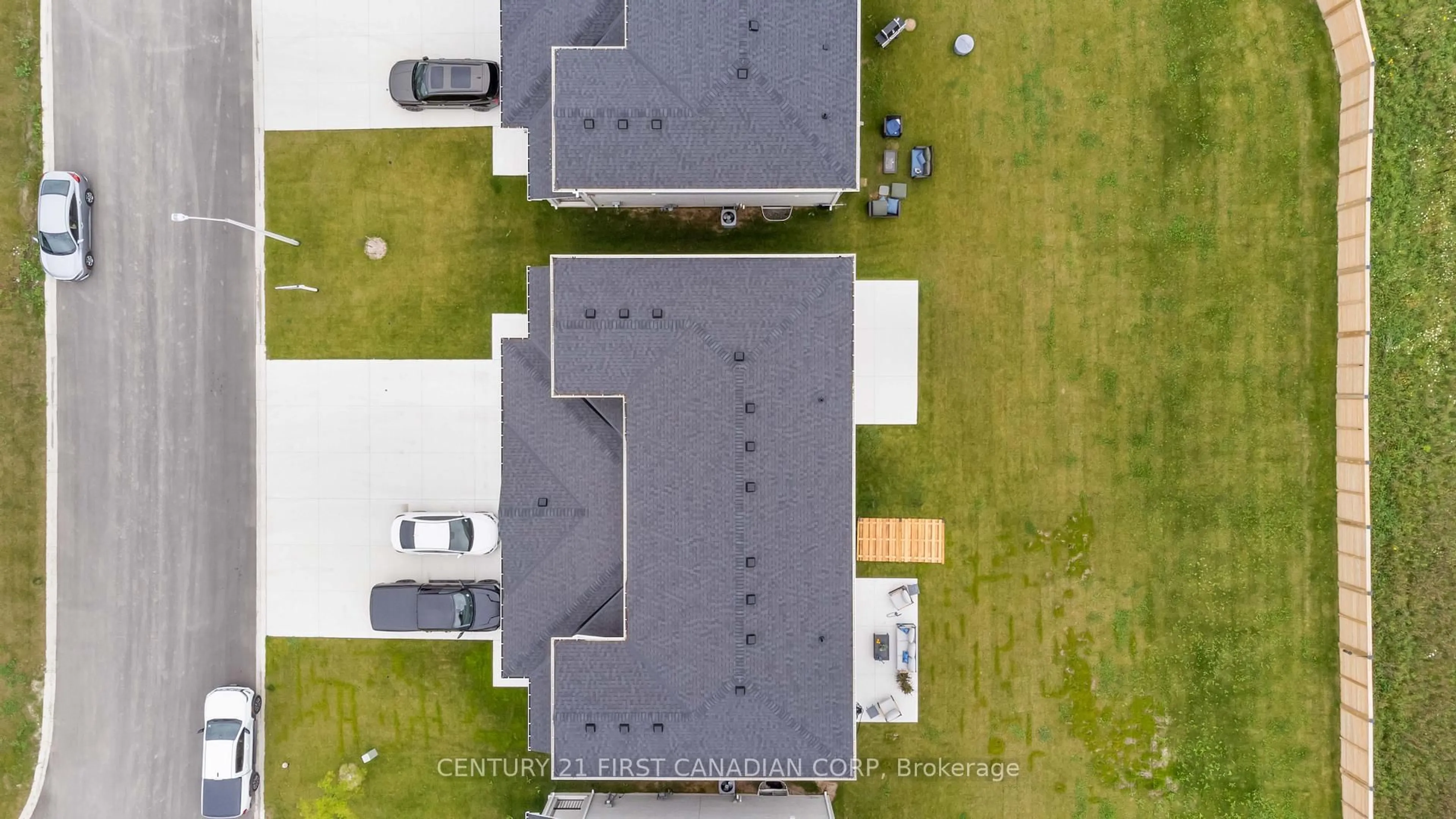 A pic from outside/outdoor area/front of a property/back of a property/a pic from drone, building for 450 Main St, Plympton-Wyoming Ontario N0N 1T0