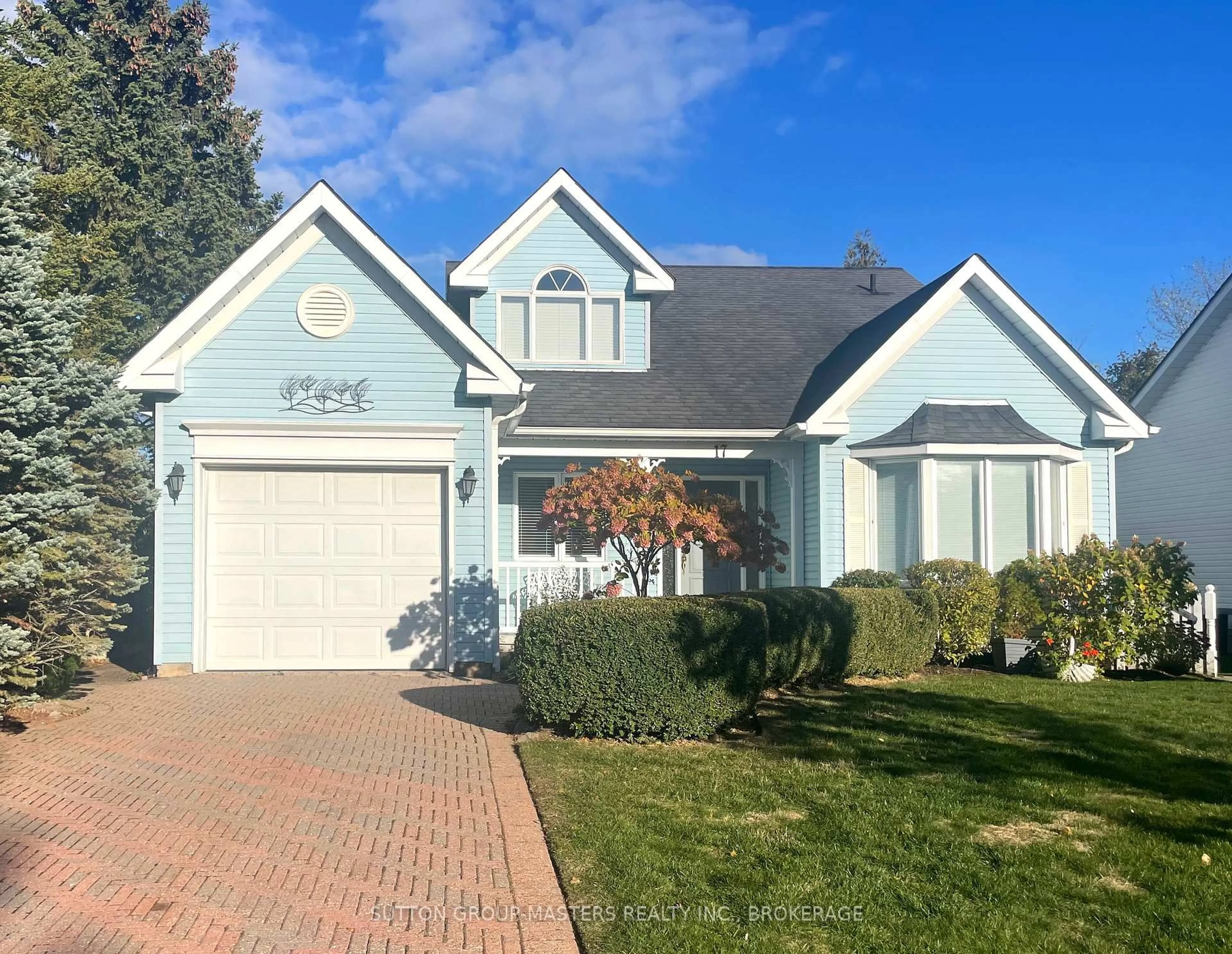 Home with vinyl exterior material, street for 17 Country Club Dr, Bath Ontario K0H 1G0