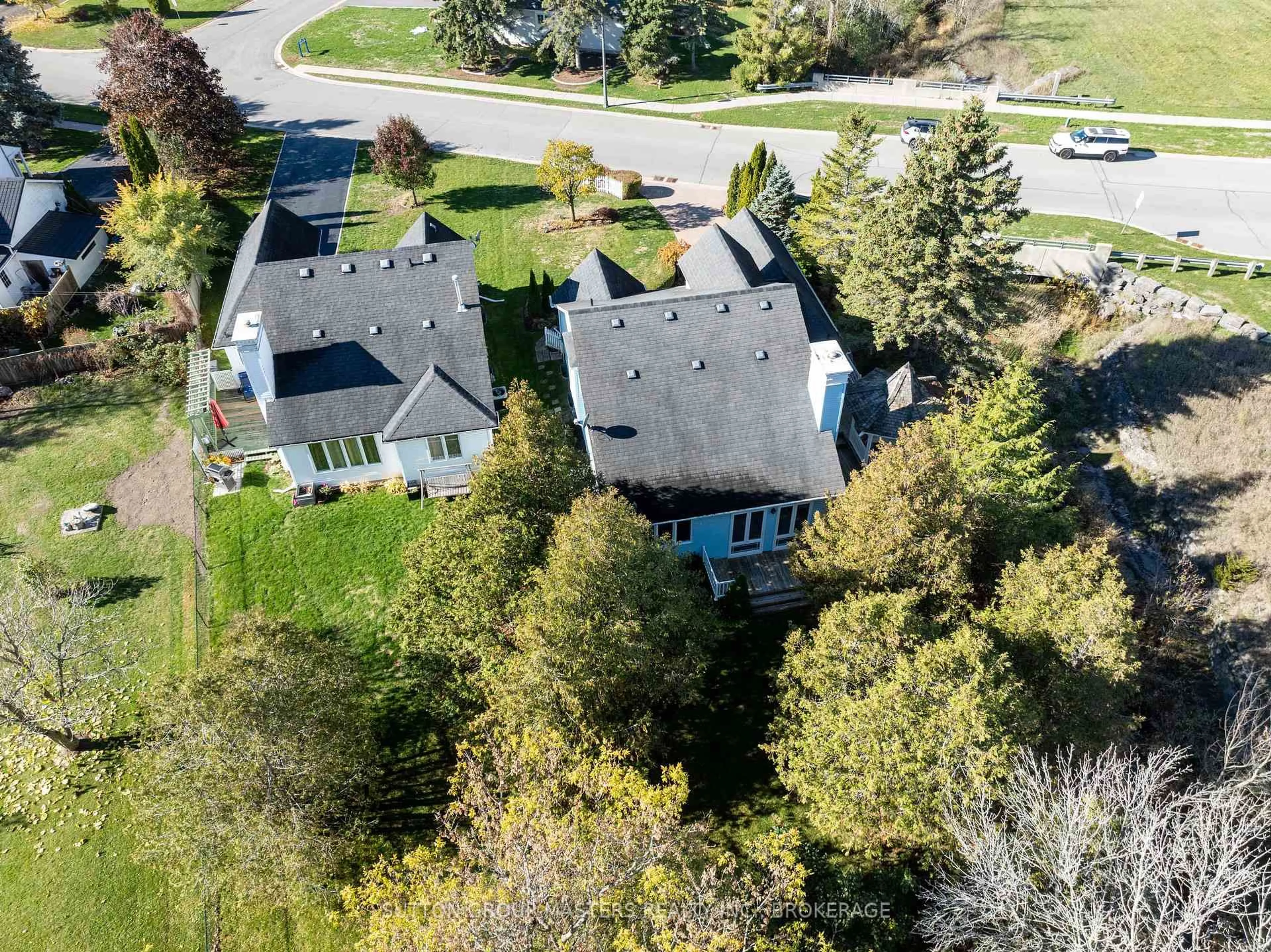 A pic from outside/outdoor area/front of a property/back of a property/a pic from drone, street for 17 Country Club Dr, Bath Ontario K0H 1G0