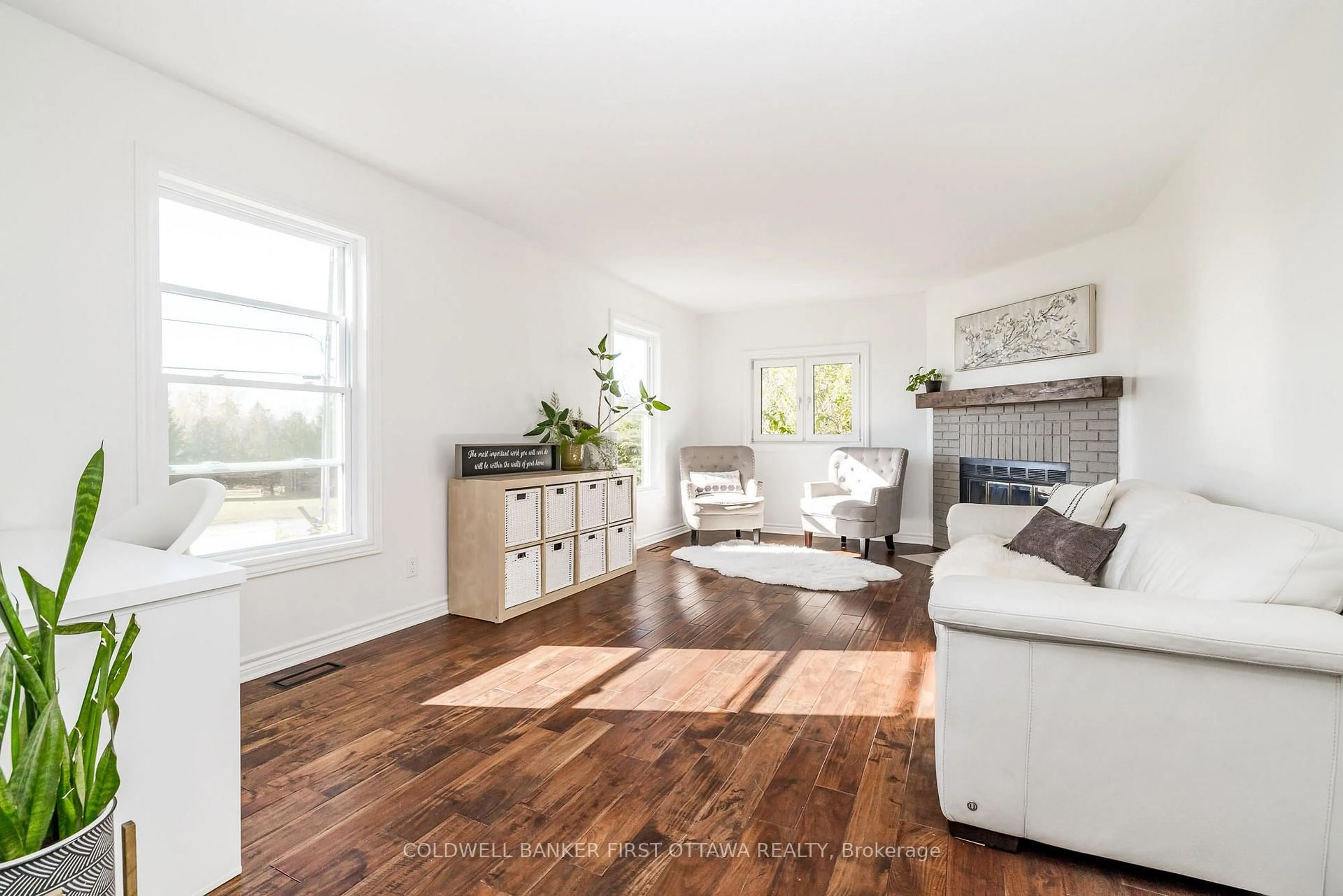 Living room with furniture, wood/laminate floor for 100 MANION HEIGHTS Cres, Carp Ontario K0A 1L0