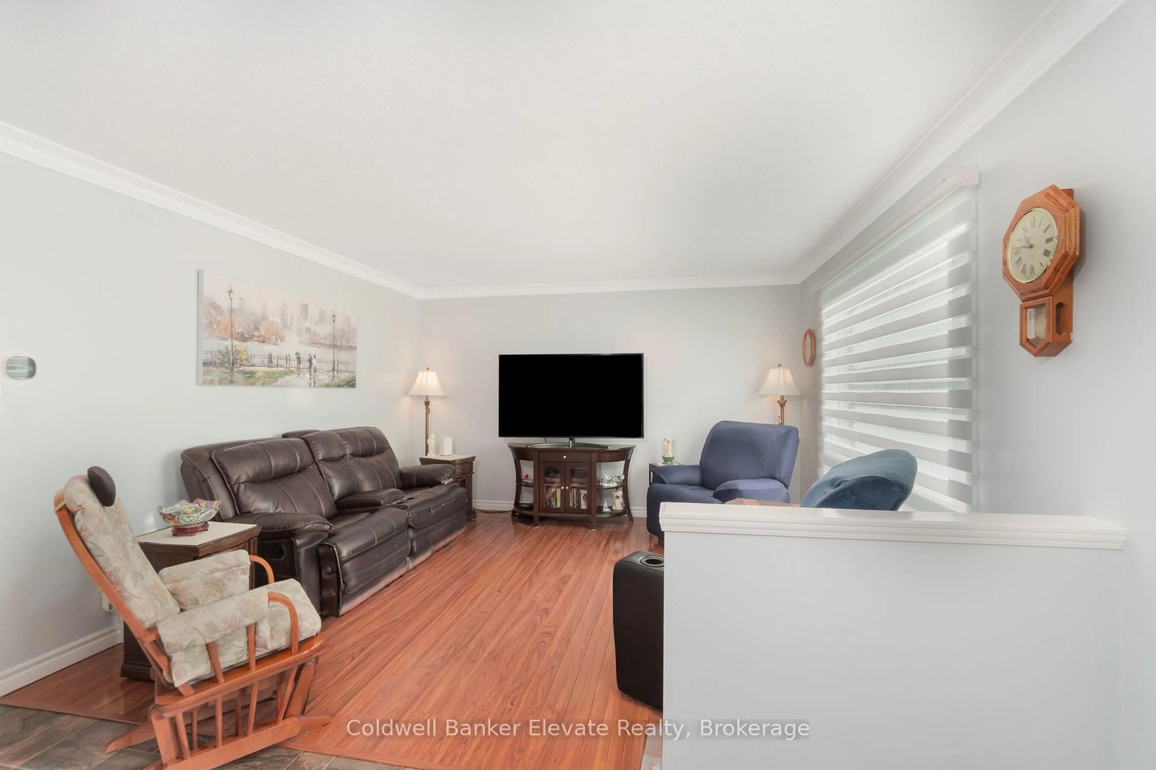 Living room with furniture, wood/laminate floor for 224 Traynor Ave, Kitchener Ontario N2C 1W6