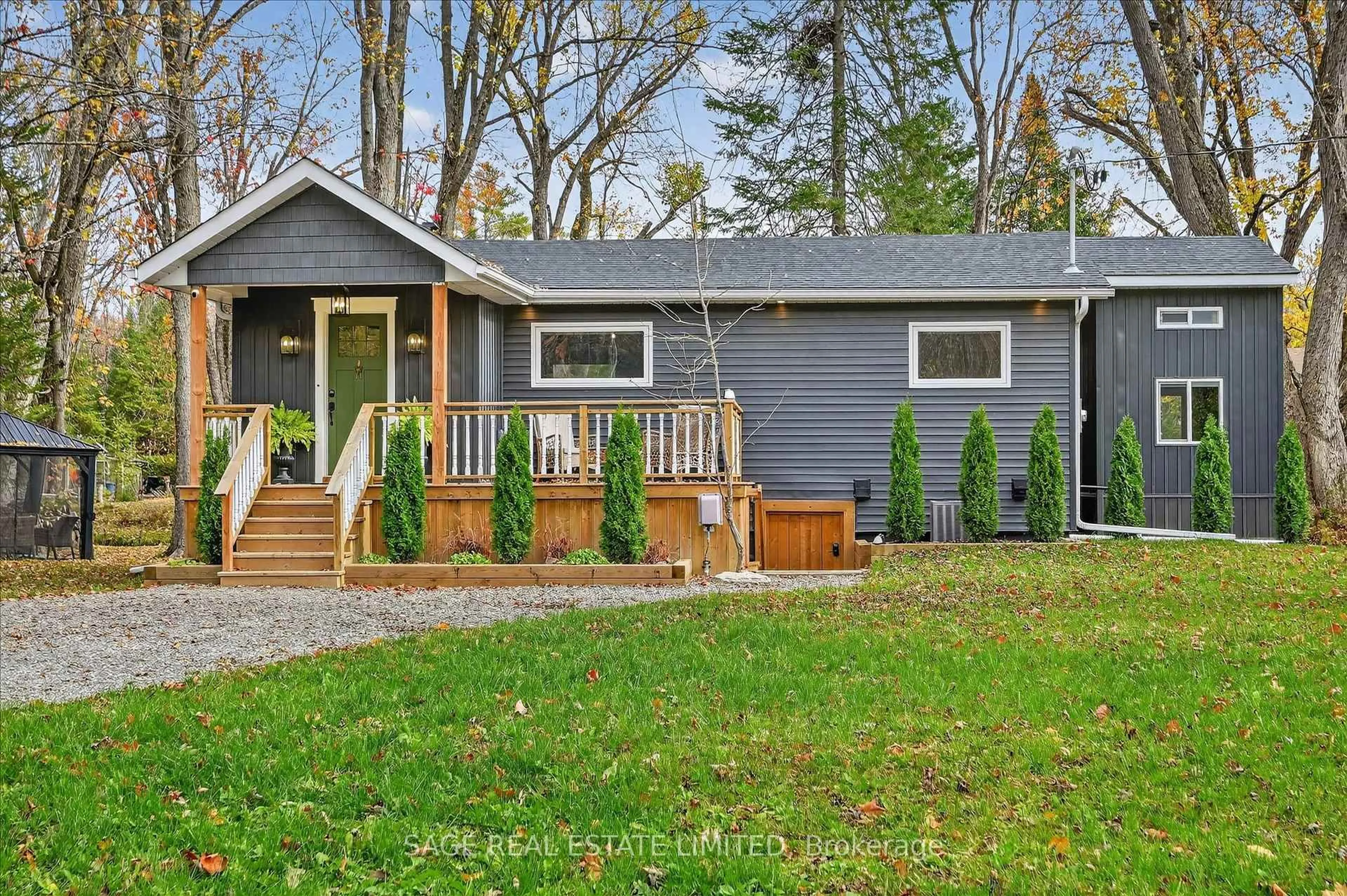 Home with vinyl exterior material, street for 51 Kennedy Dr, Trent Lakes Ontario K0M 1A0