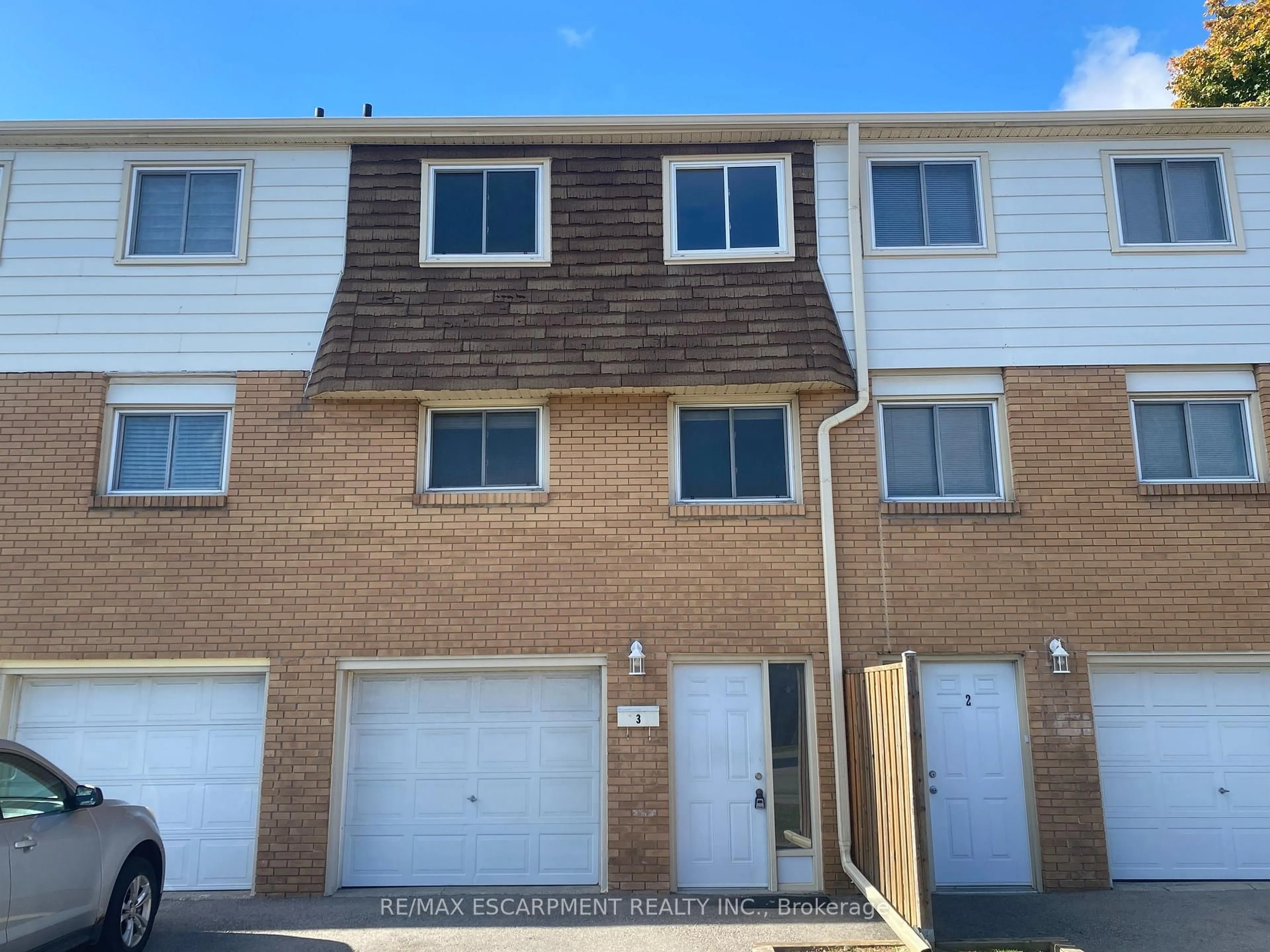 A pic from outside/outdoor area/front of a property/back of a property/a pic from drone, street for 1025 Upper Gage Ave #3, Hamilton Ontario L8V 4L2