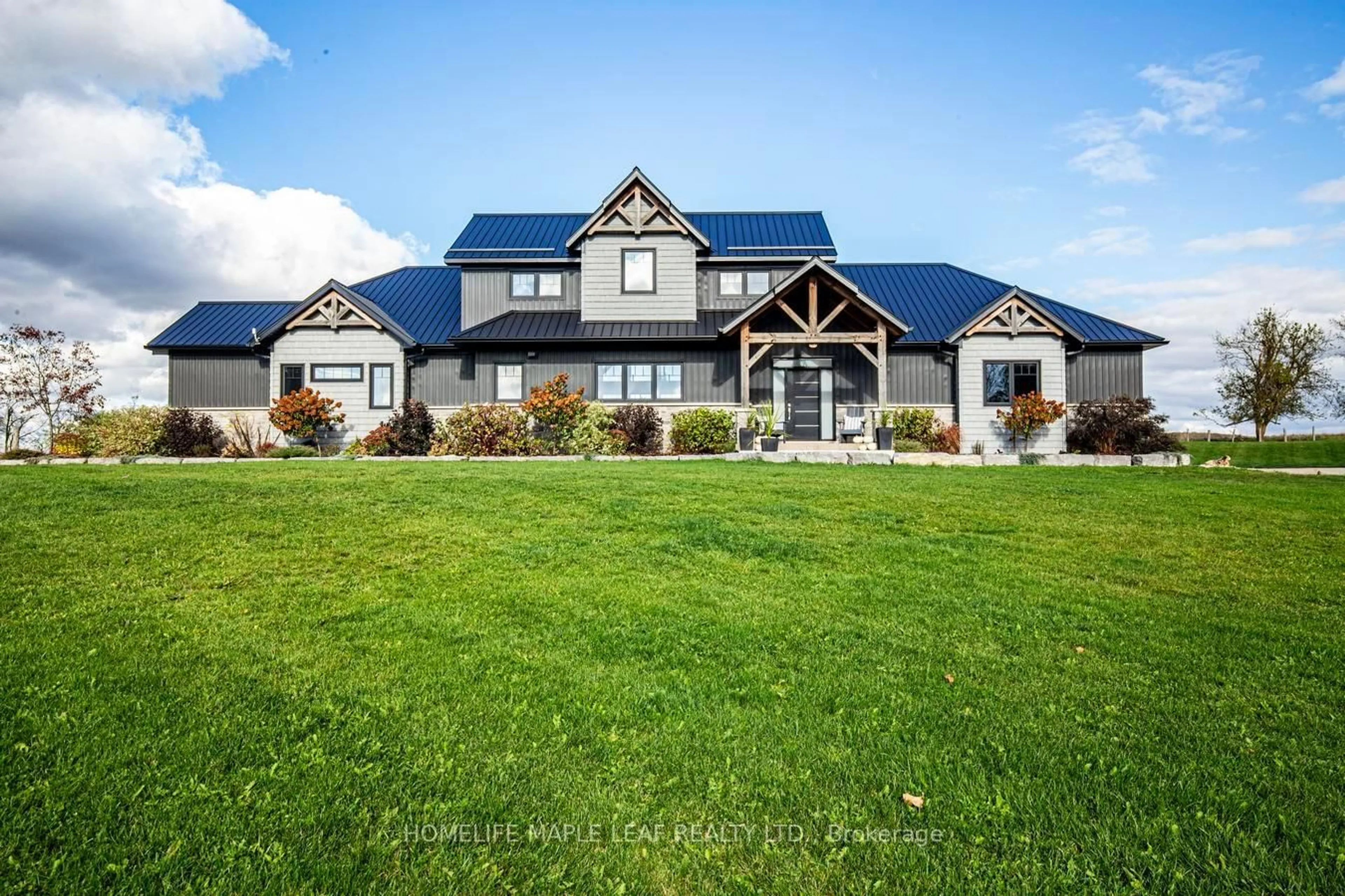 Home with vinyl exterior material, mountain view for 585437 County Rd #17, Melancthon Ontario L9V 1Z1