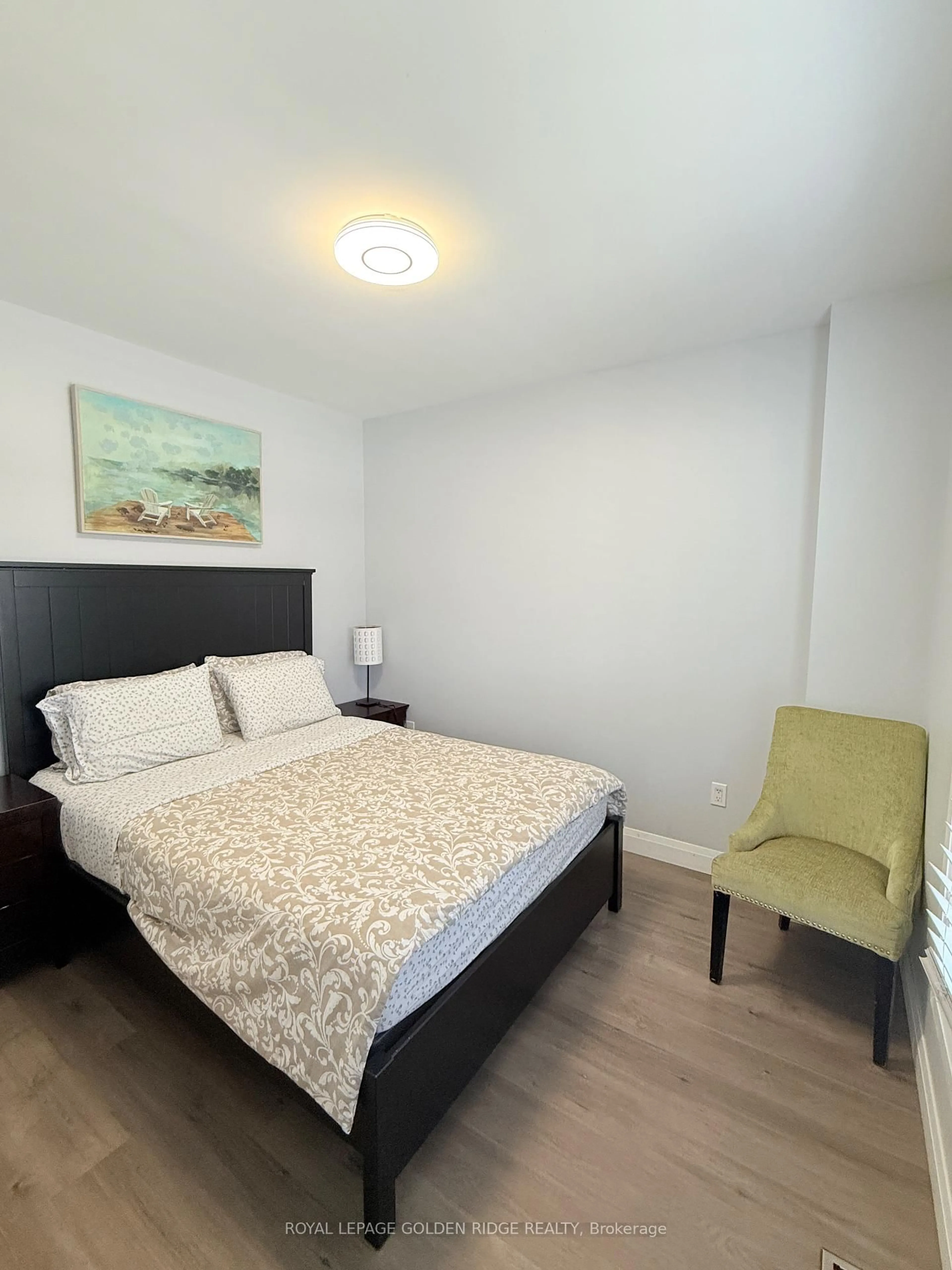 Bedroom with bed, wood/laminate floor for 4577 Victoria Ave, Niagara Falls Ontario L2E 4B5