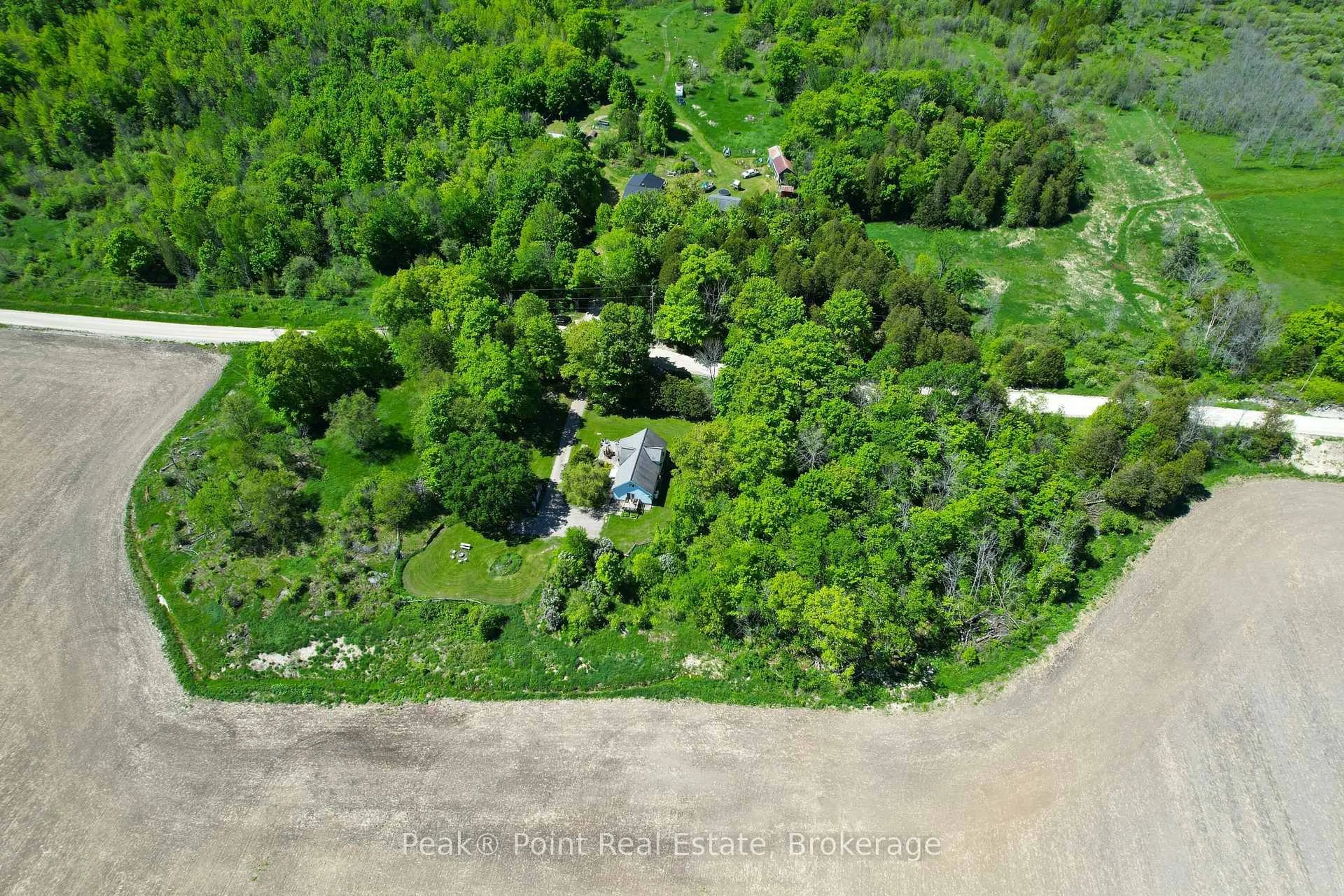 A pic from outside/outdoor area/front of a property/back of a property/a pic from drone, forest/trees view for 2026 The Bury Rd, Northern Bruce Peninsula Ontario N0H 1W0
