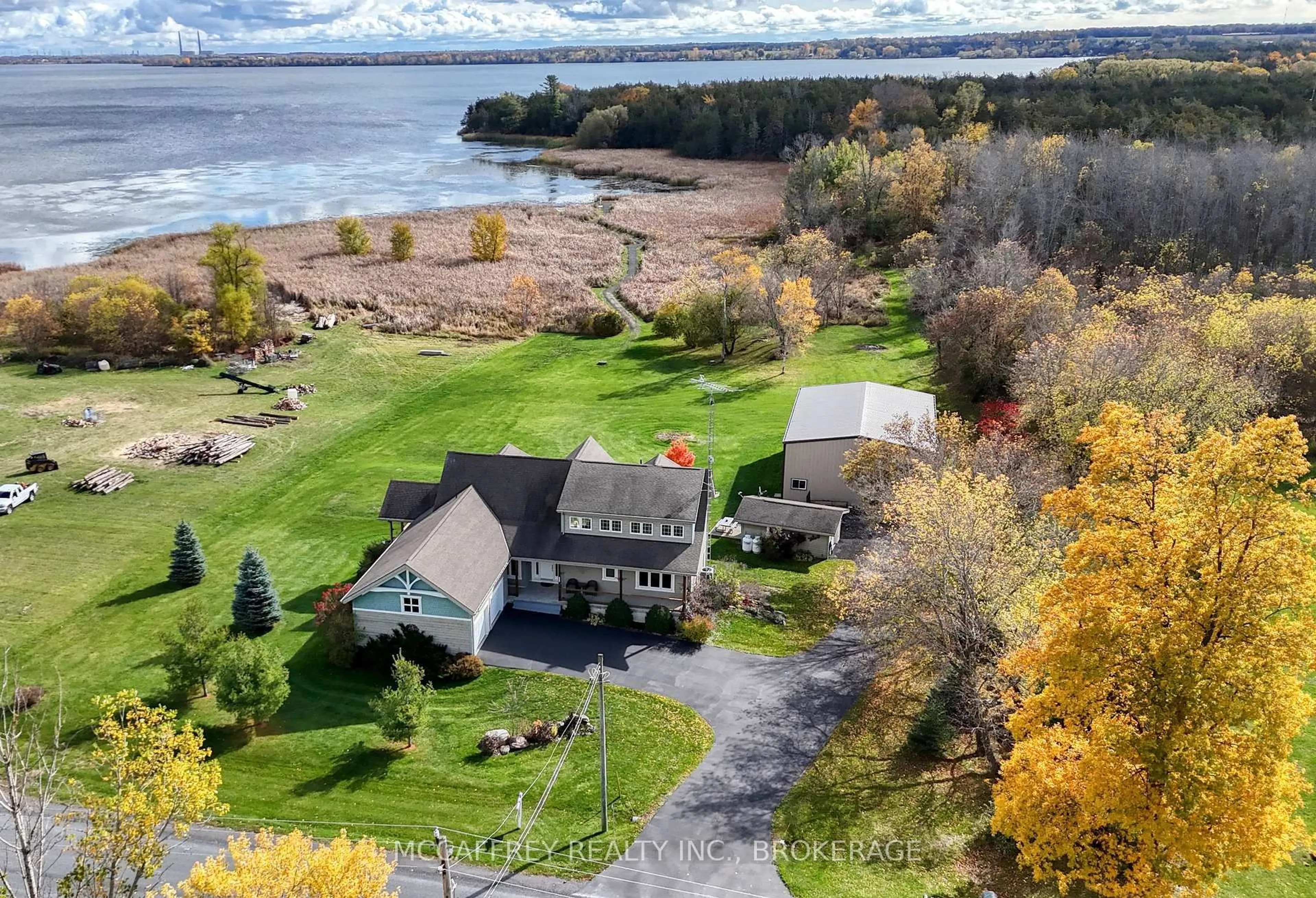 A pic from outside/outdoor area/front of a property/back of a property/a pic from drone, water/lake/river/ocean view for 6019 County Road 9, Napanee Ontario K7R 3K8