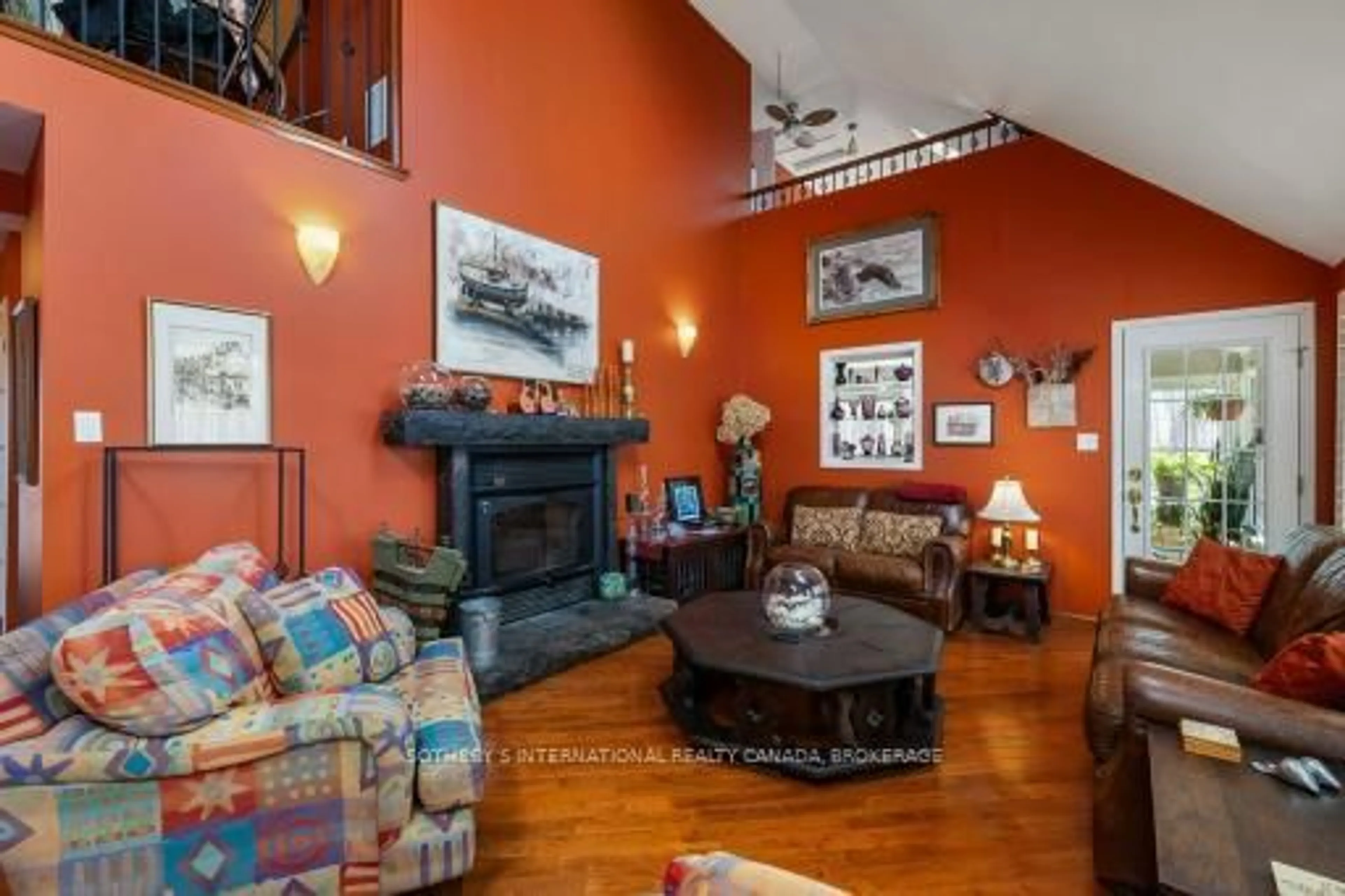 Living room with furniture, wood/laminate floor for 479 Cunningham Road Sdrd, Gananoque Ontario K7G 2V4