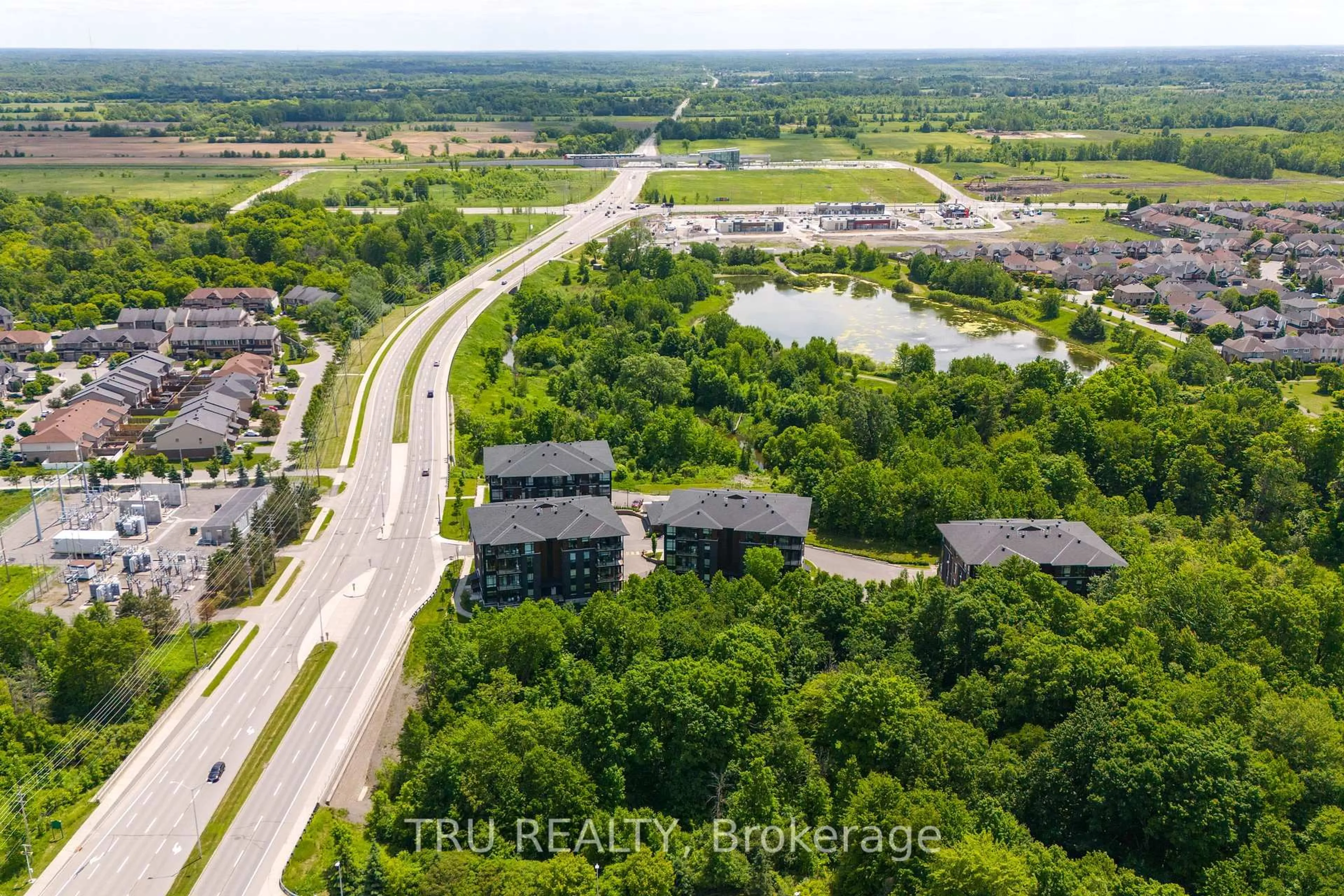 A pic from outside/outdoor area/front of a property/back of a property/a pic from drone, water/lake/river/ocean view for 120 Cortile Private #201, Ottawa Ontario K1V 2S8