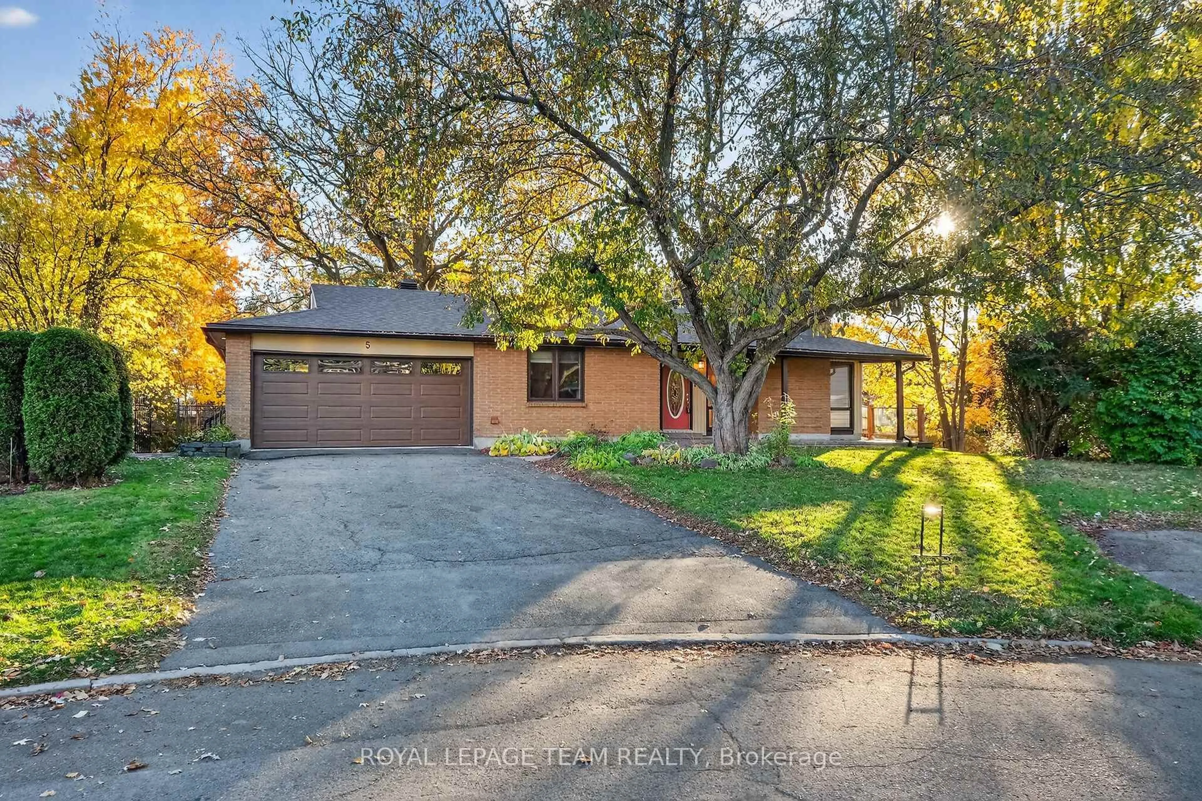 Home with brick exterior material, street for 5 Gladiola Pl, Ottawa Ontario K2G 0V4