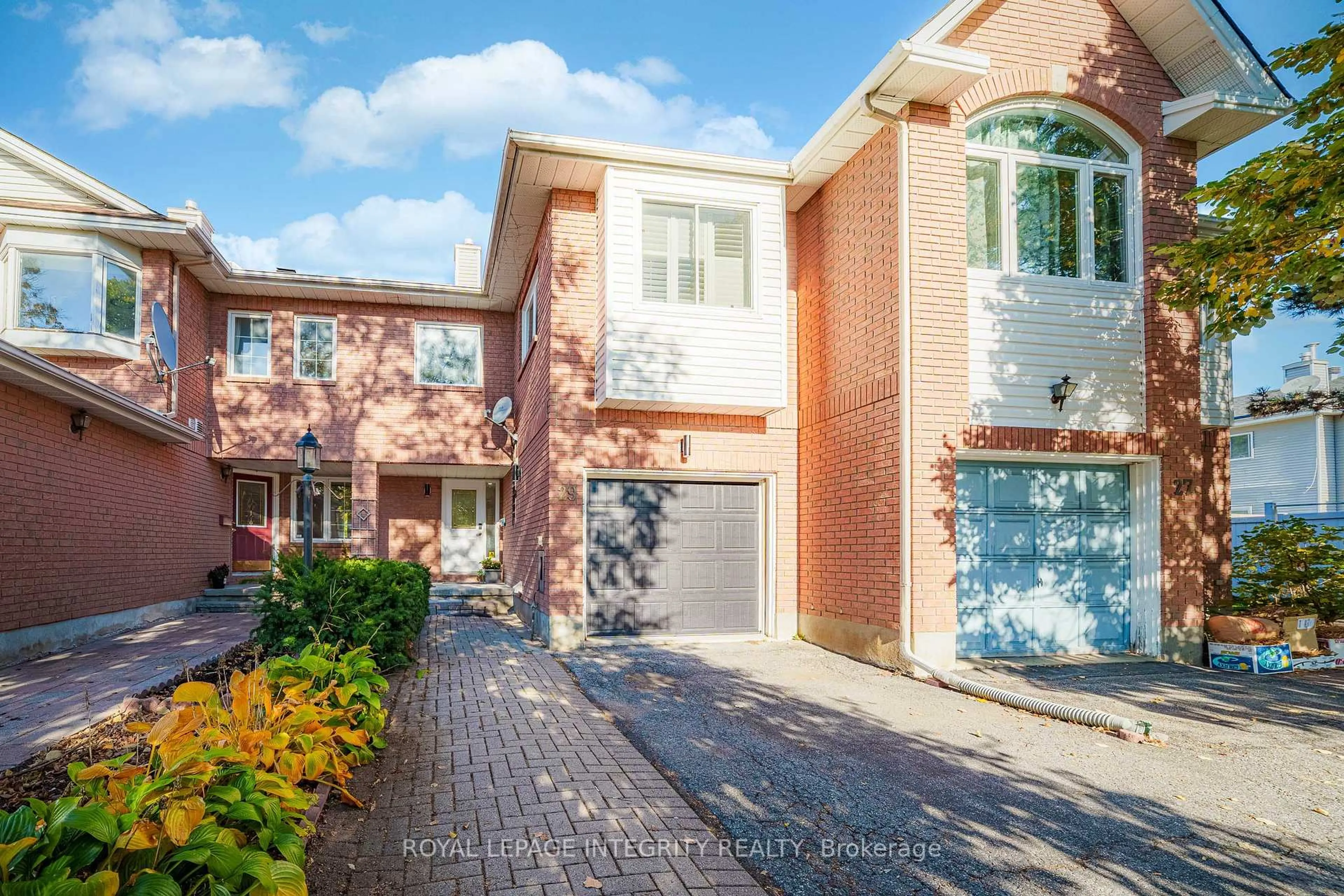 Home with brick exterior material, street for 29 Hemmingwood Way, Ottawa Ontario K2G 6B9