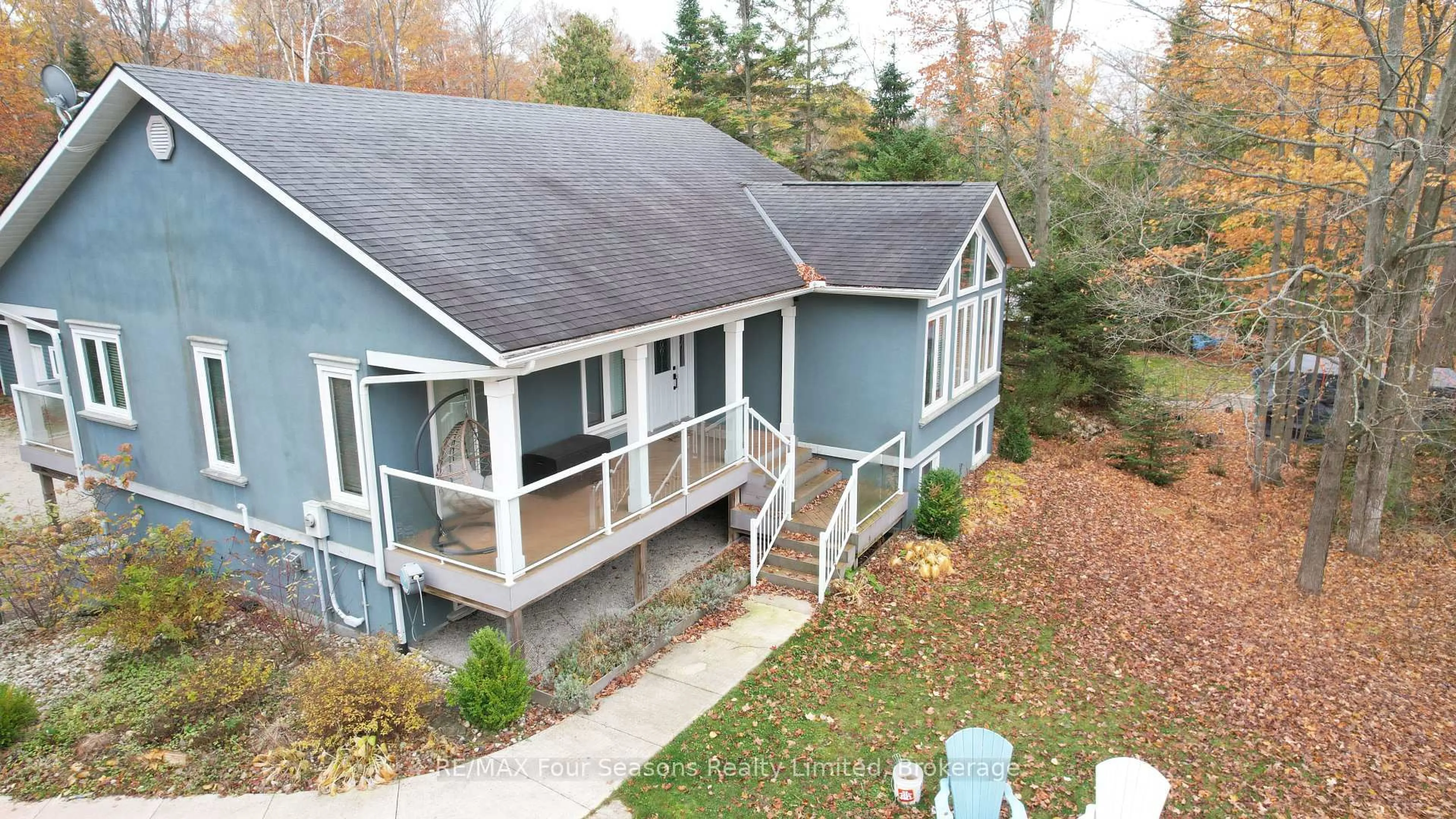 A pic from outside/outdoor area/front of a property/back of a property/a pic from drone, water/lake/river/ocean view for 37 Silver Lake Cres, South Bruce Peninsula Ontario N0H 2G0