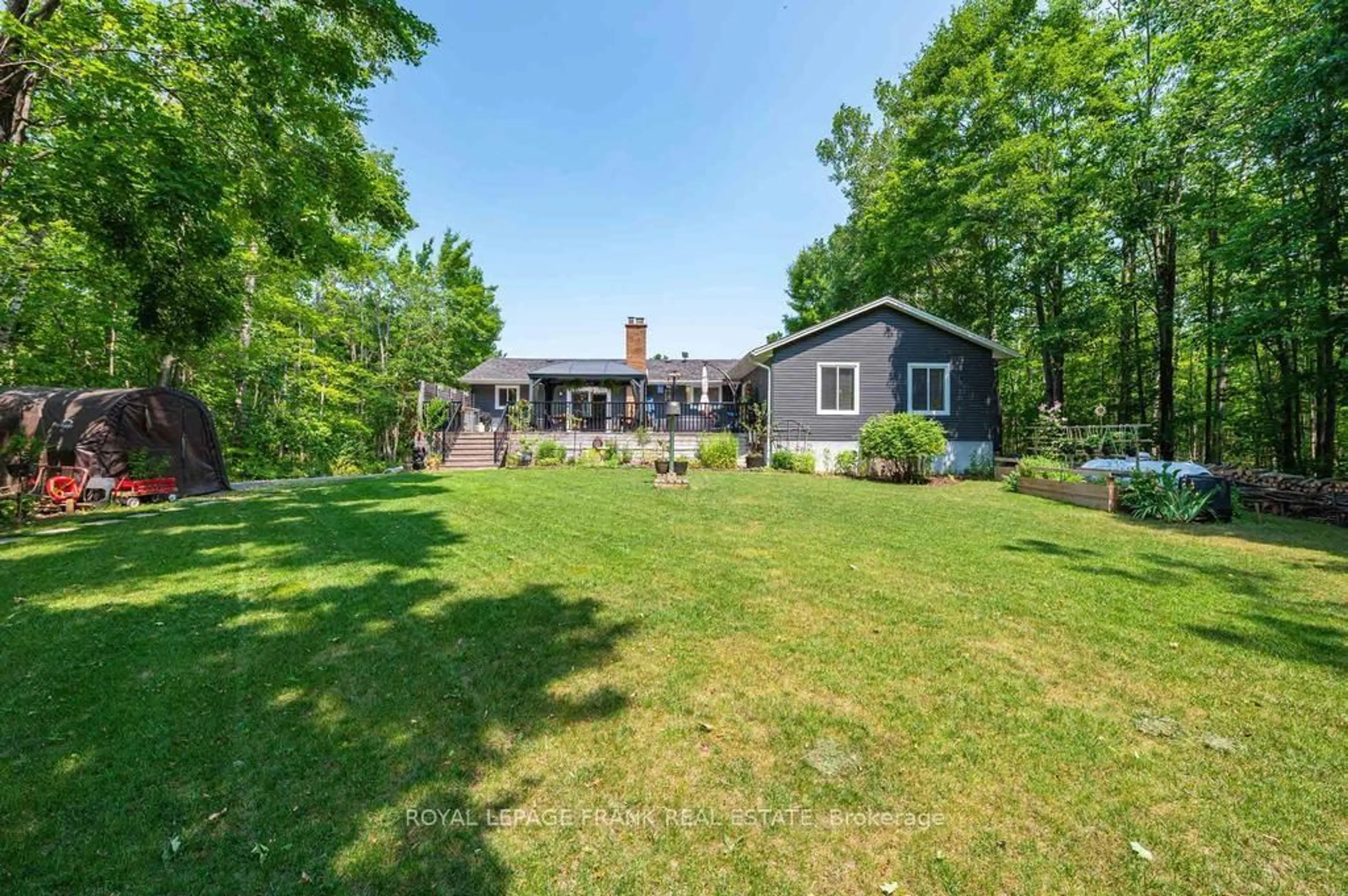 A pic from outside/outdoor area/front of a property/back of a property/a pic from drone, water/lake/river/ocean view for 1746 Lakehurst Rd, Trent Lakes Ontario K0L 1J0