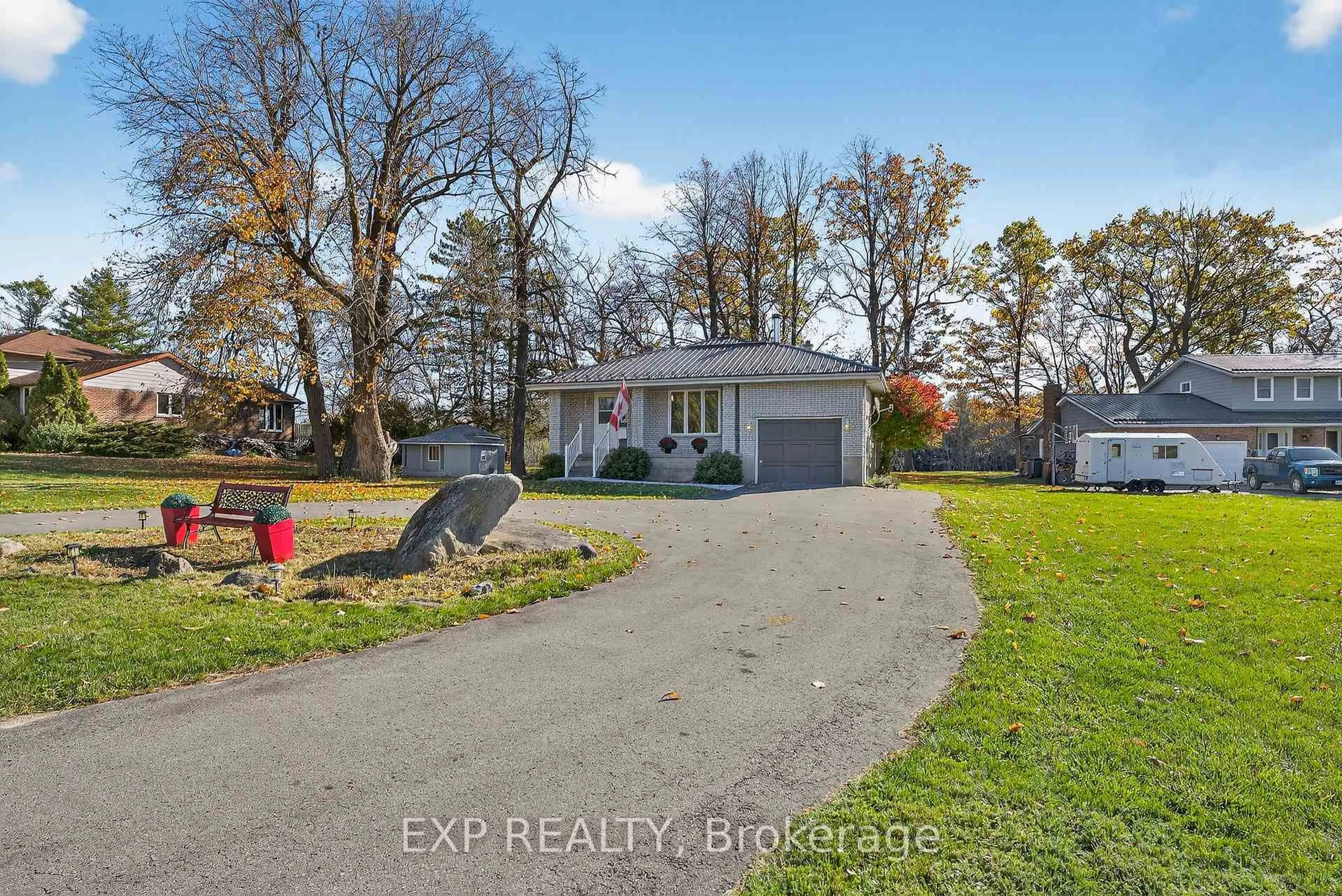 A pic from outside/outdoor area/front of a property/back of a property/a pic from drone, water/lake/river/ocean view for 47 Fox Lane, Quinte West Ontario K0K 2B0
