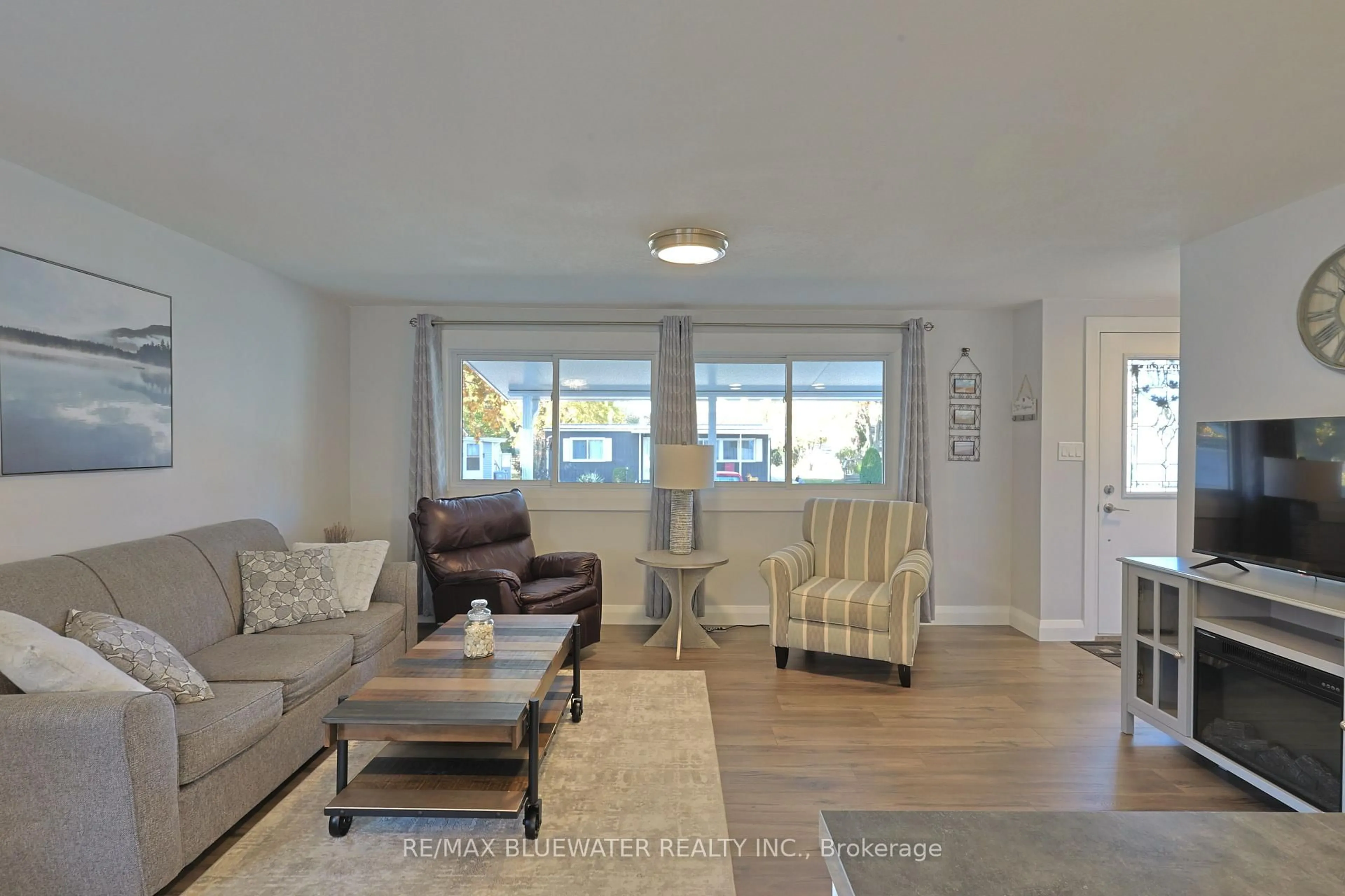 Living room with furniture, unknown for 79 Pebble Beach Pkwy, South Huron Ontario N0M 1T0