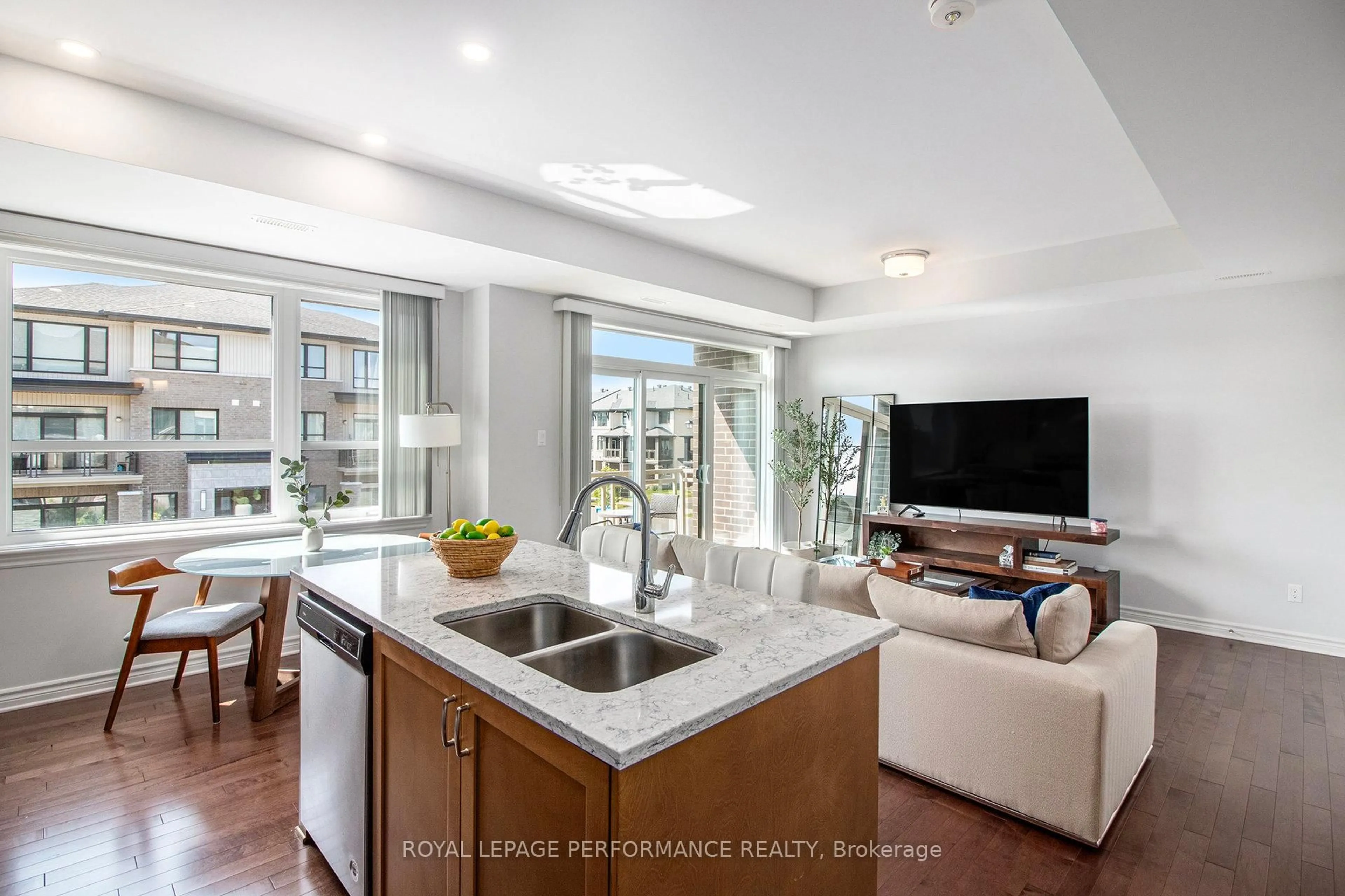 Open concept kitchen, ceramic/tile floor for 84 Carabiner Private, Ottawa Ontario K1W 0L7