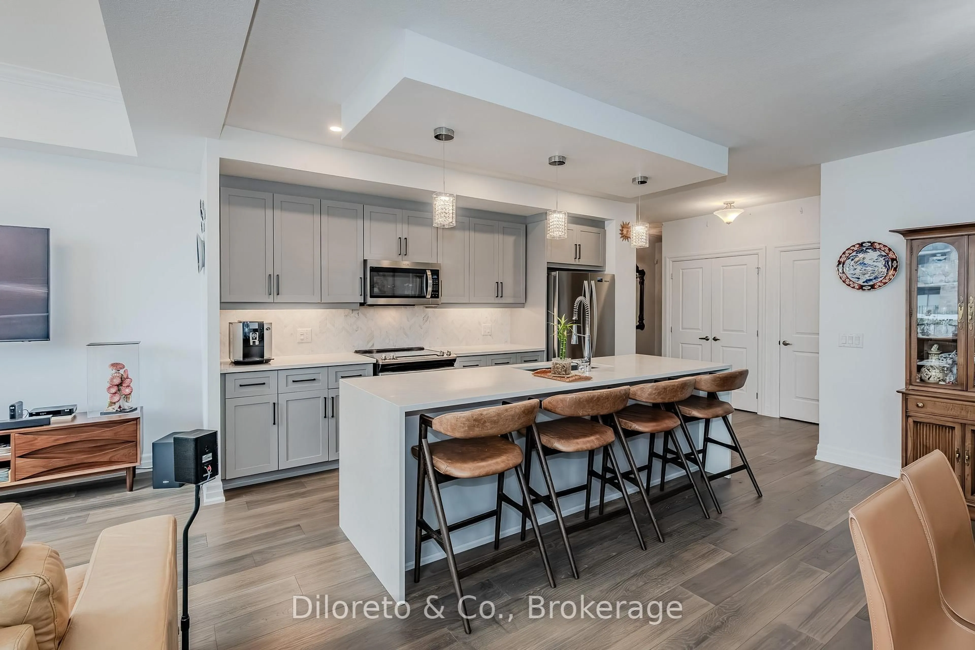 Open concept kitchen, ceramic/tile floor for 1878 Gordon St #105, Guelph Ontario N1L 0P4