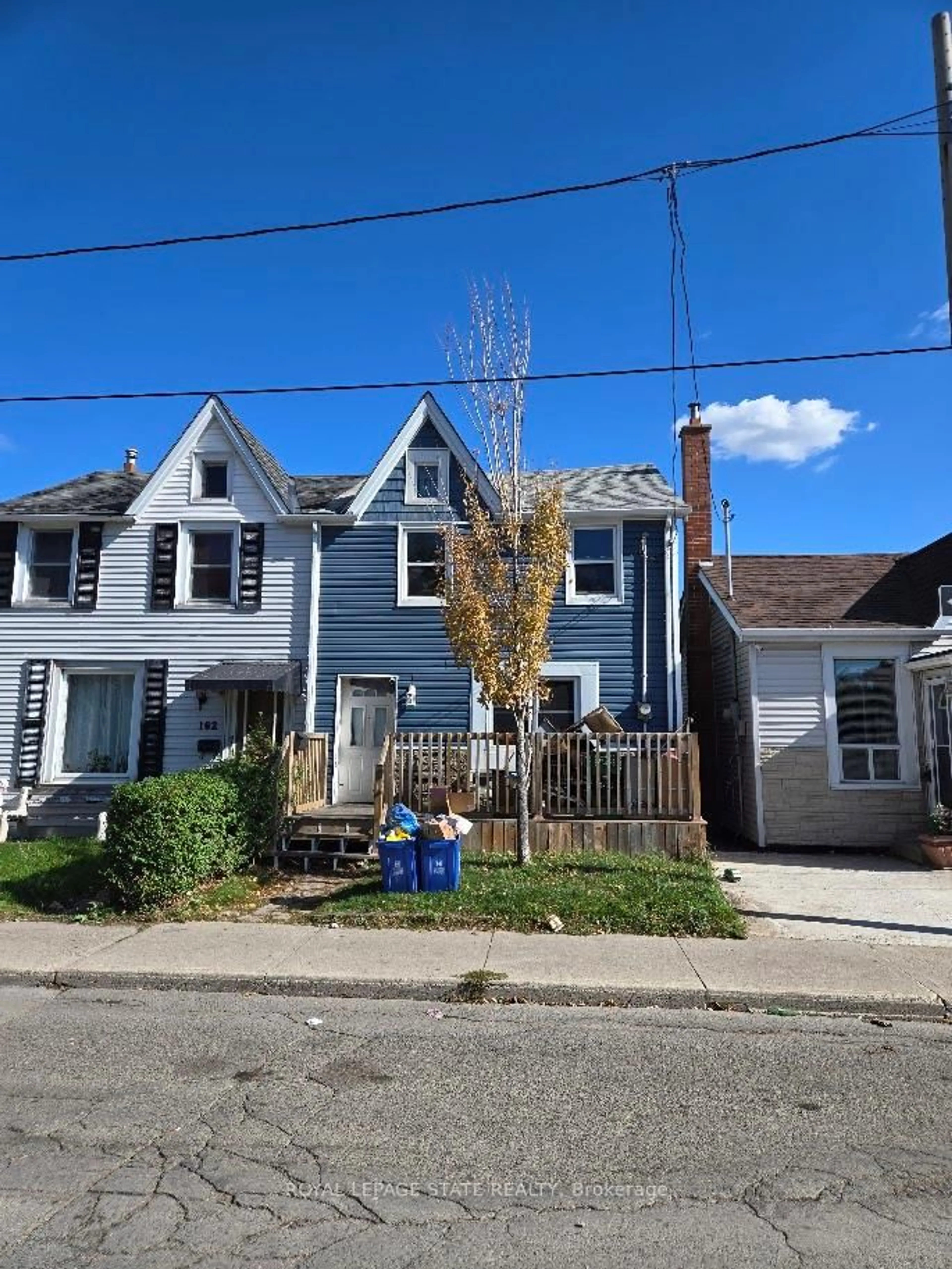 A pic from outside/outdoor area/front of a property/back of a property/a pic from drone, street for 160 Sanford Ave, Hamilton Ontario L8L 5Z7