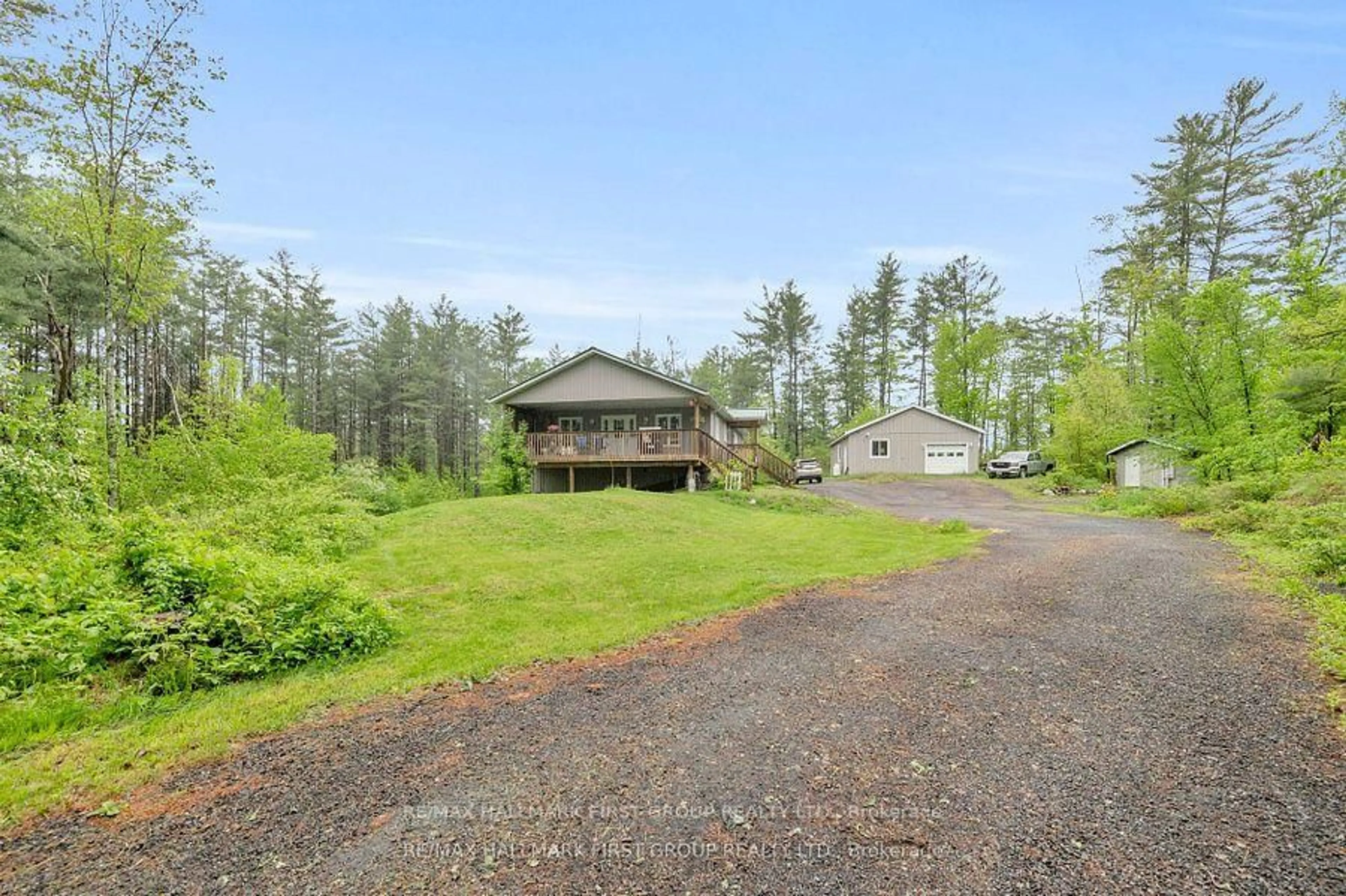 A pic from outside/outdoor area/front of a property/back of a property/a pic from drone, unknown for 112 Moores Rd, Tweed Ontario K0K 3J0