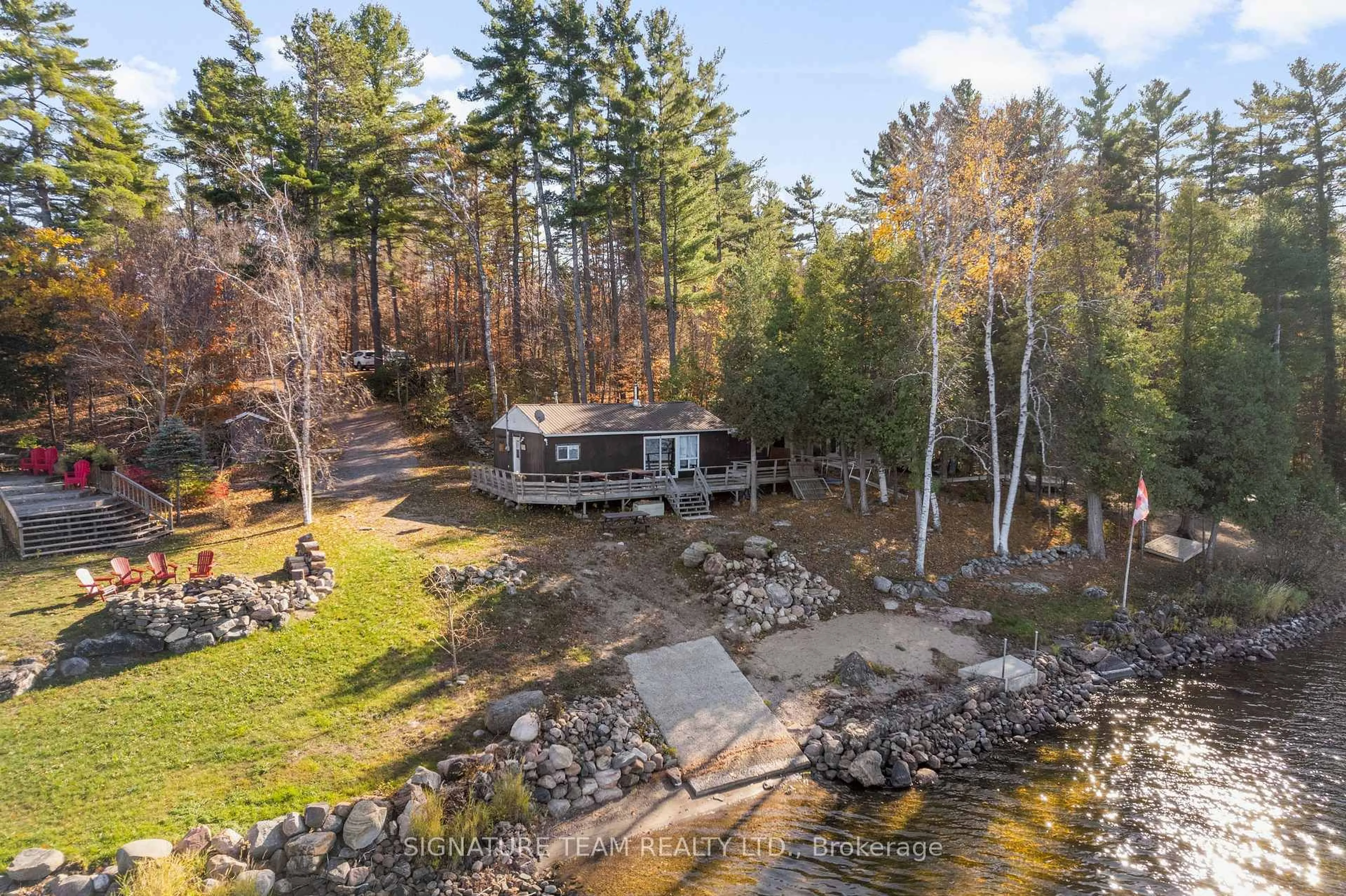 A pic from outside/outdoor area/front of a property/back of a property/a pic from drone, water/lake/river/ocean view for 368 Rocky Point Dr, Golden Lake Ontario K0J 1X0
