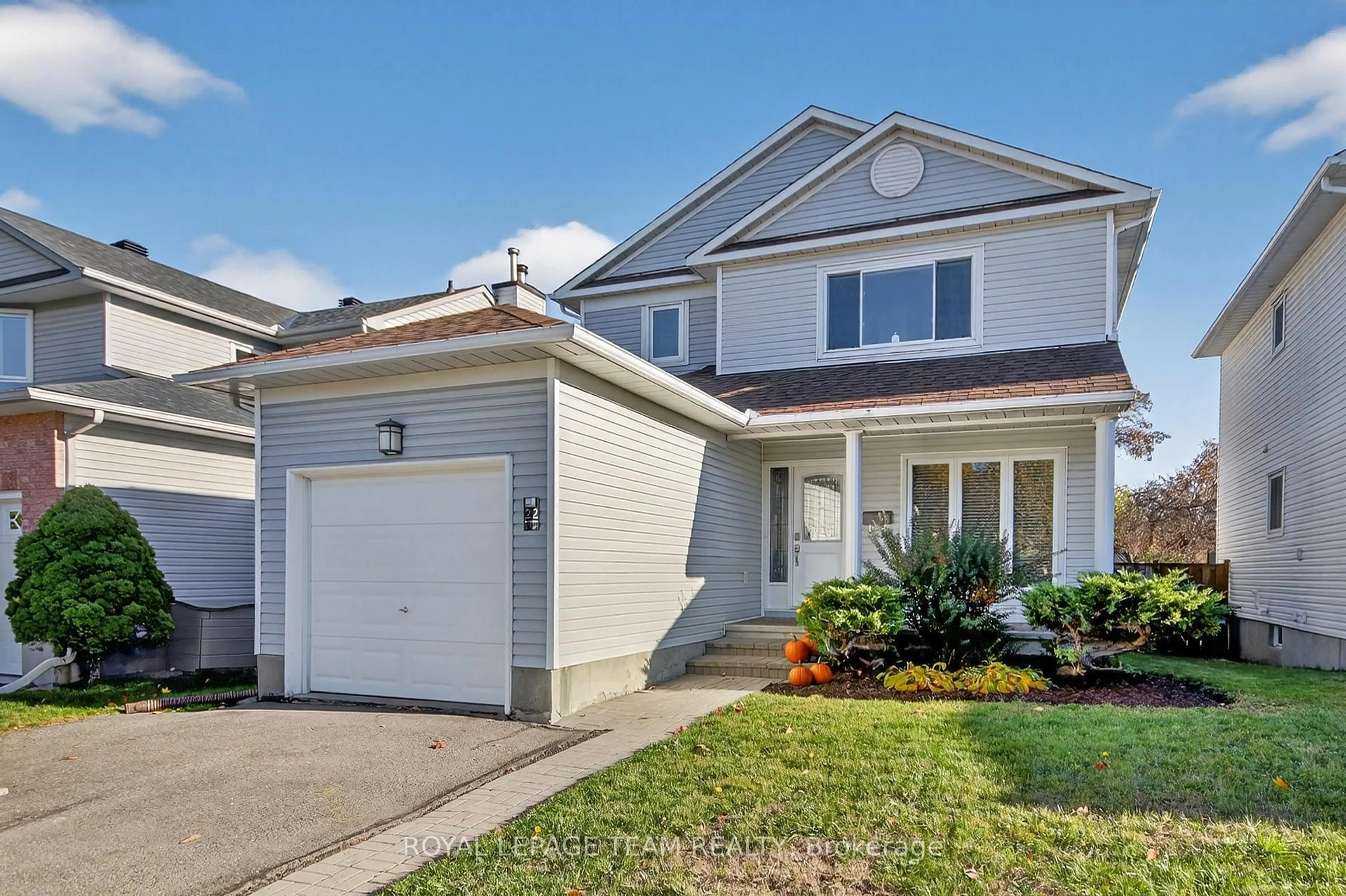 Home with vinyl exterior material, street for 22 Vesta St, Ottawa Ontario K2J 3Y9