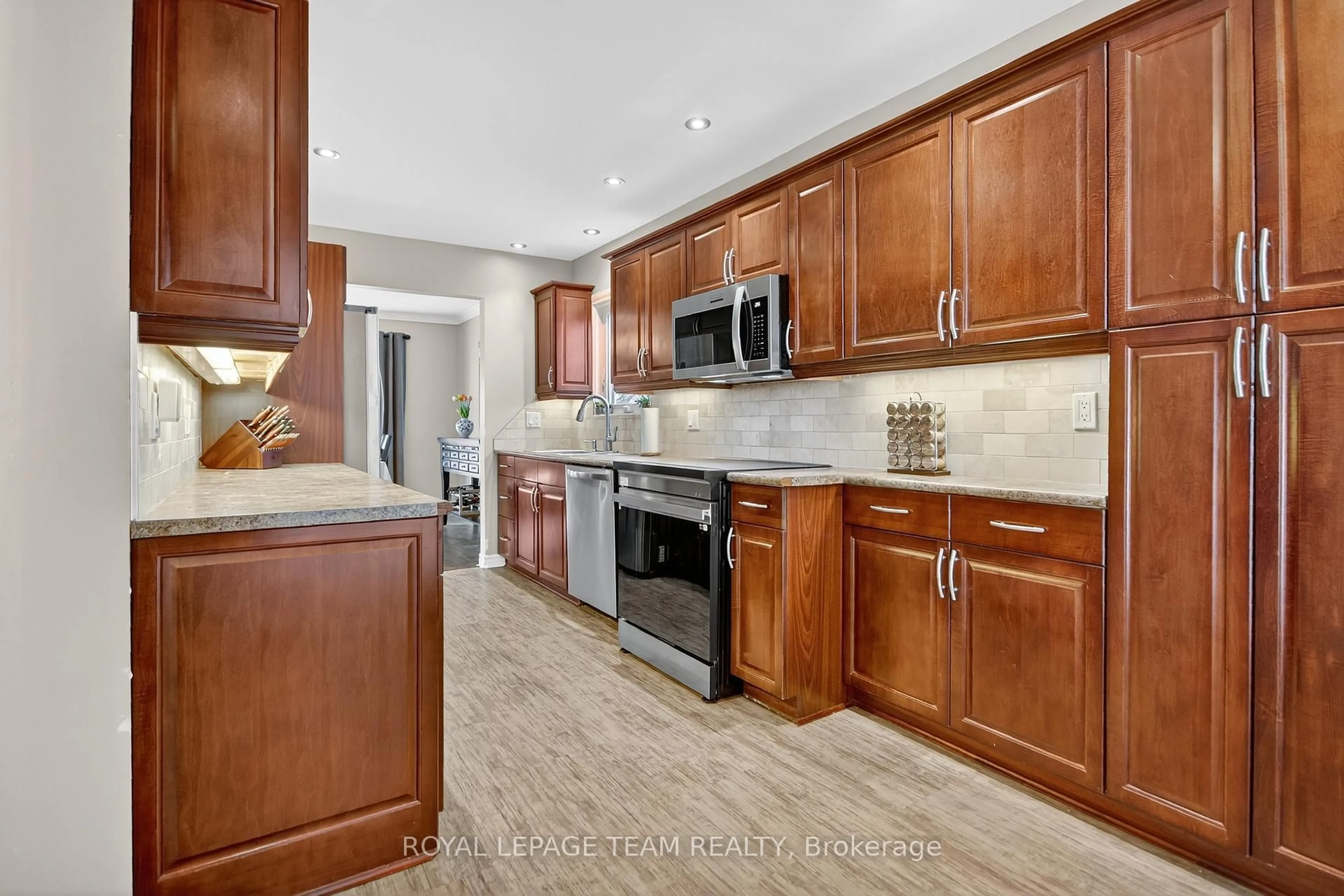 Open concept kitchen, ceramic/tile floor for 22 Vesta St, Ottawa Ontario K2J 3Y9