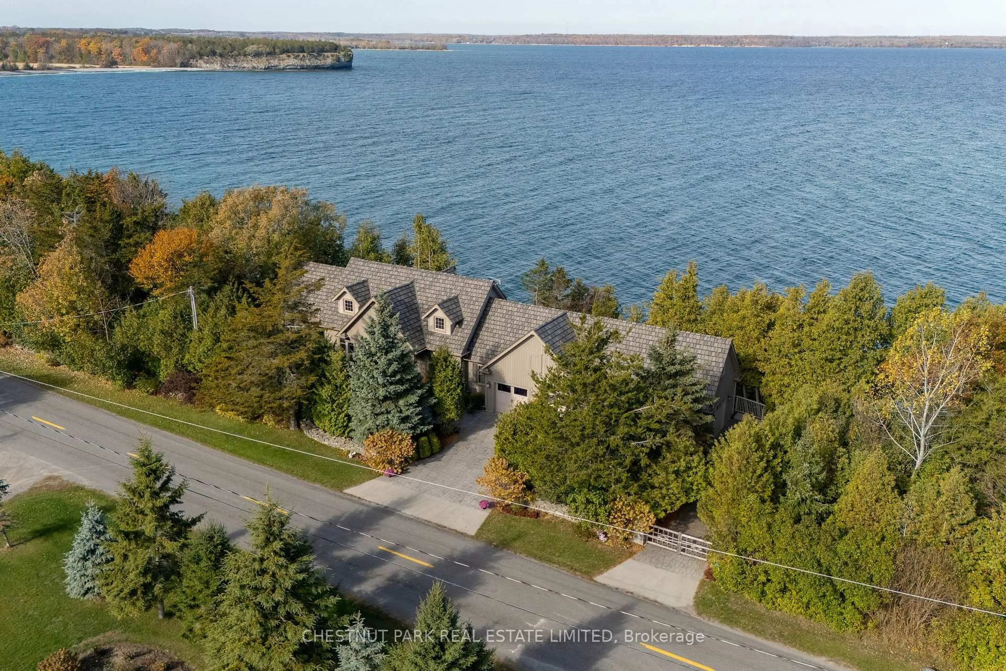 A pic from outside/outdoor area/front of a property/back of a property/a pic from drone, water/lake/river/ocean view for 3853 County Road 13, Prince Edward County Ontario K0K 2T0