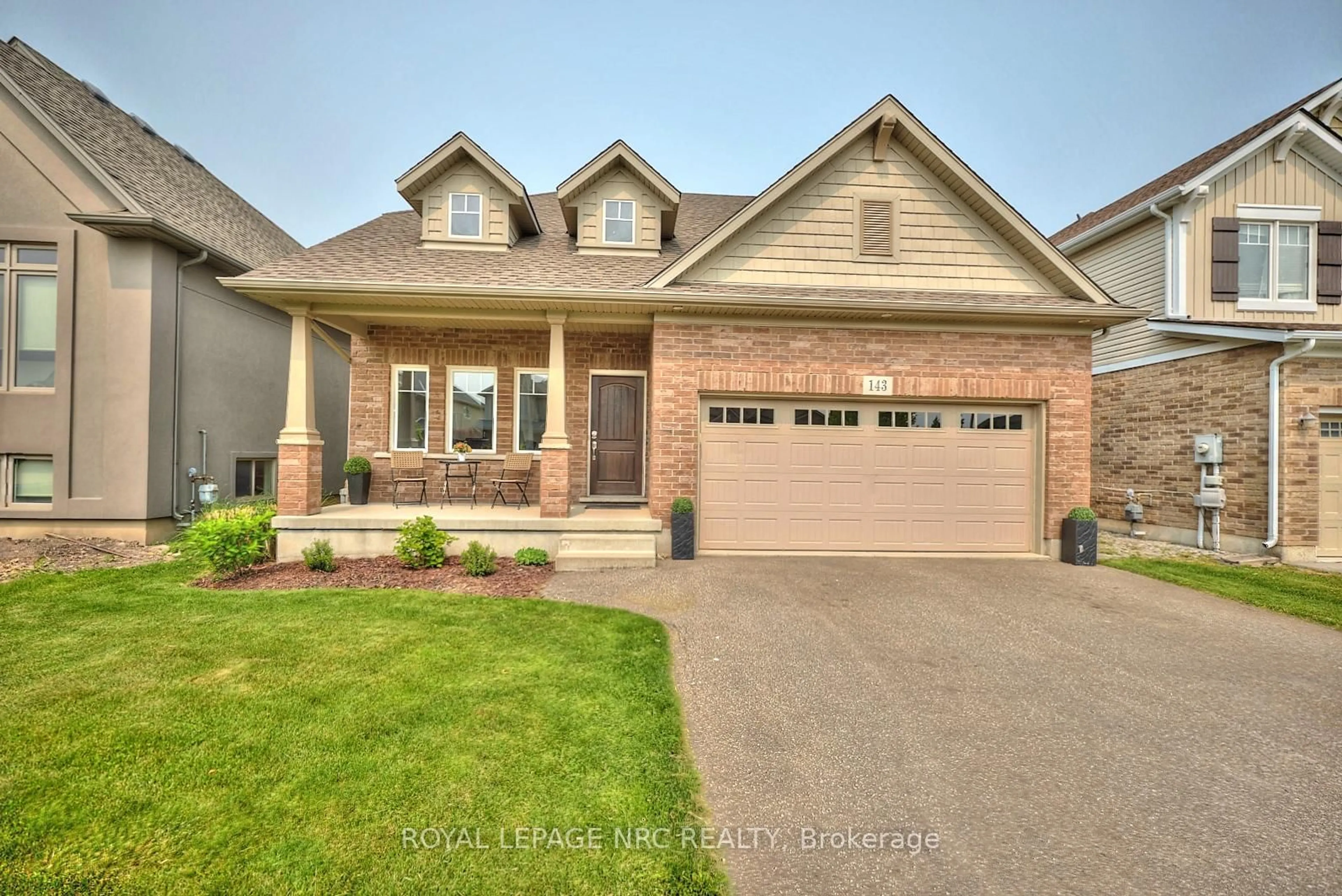 Home with brick exterior material, street for 143 Tuliptree Rd, Thorold Ontario L2V 0A5