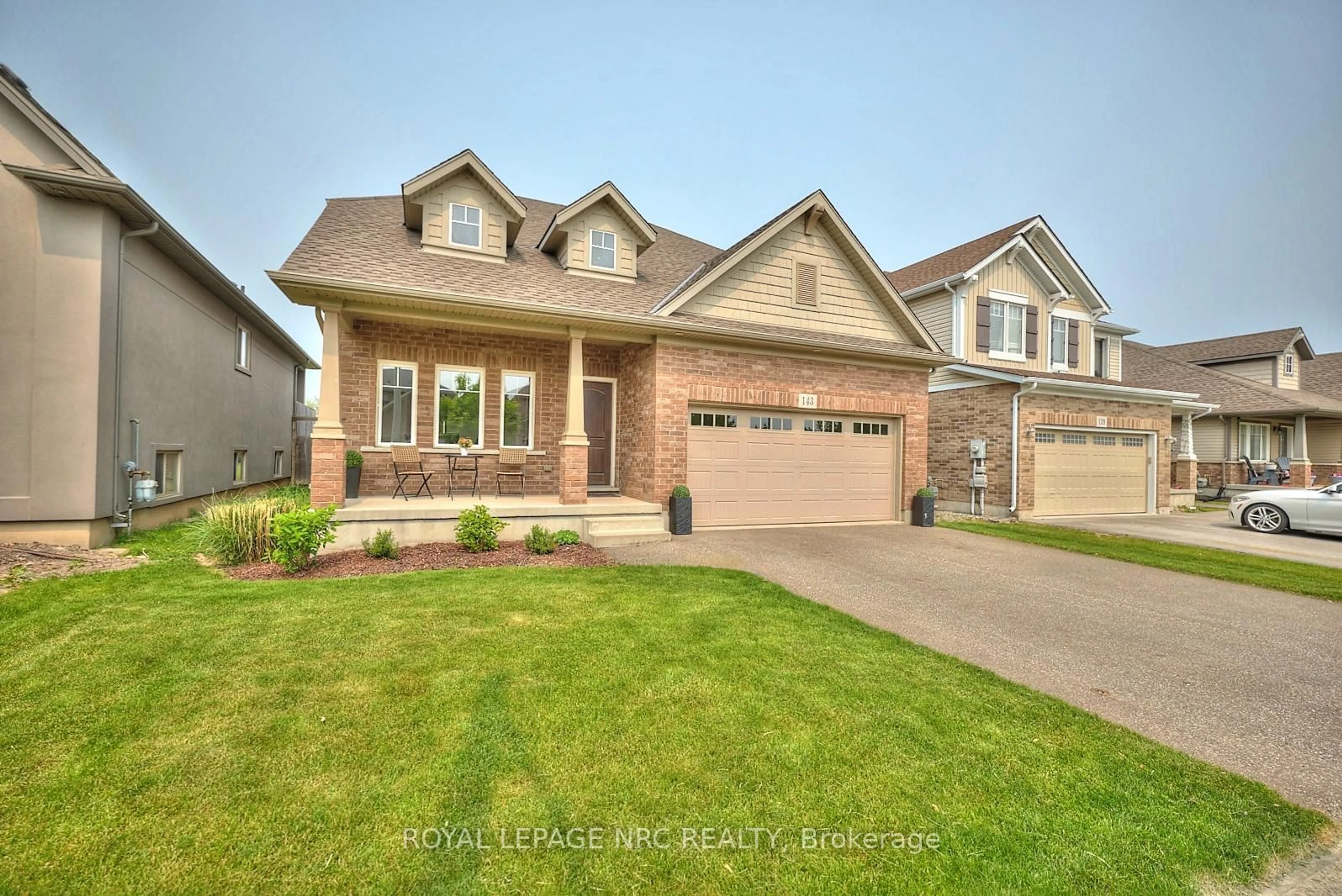 Home with brick exterior material, street for 143 Tuliptree Rd, Thorold Ontario L2V 0A5