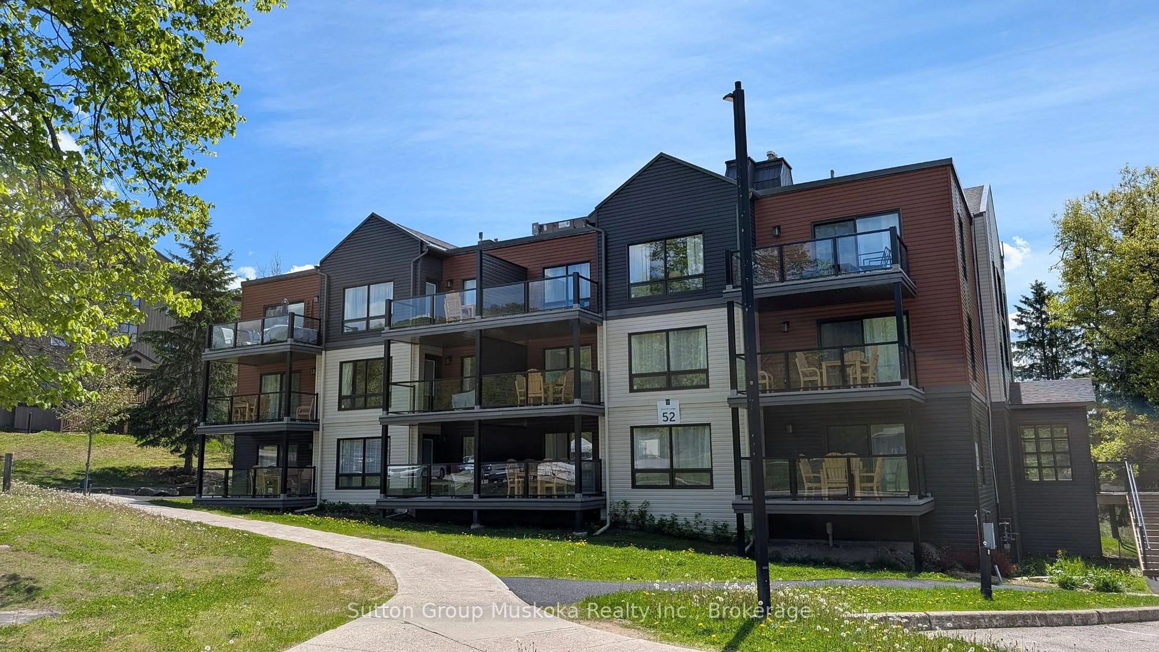 A pic from outside/outdoor area/front of a property/back of a property/a pic from drone, unknown for 1235 Deerhurst Dr #52-308, Huntsville Ontario P1H 2E8