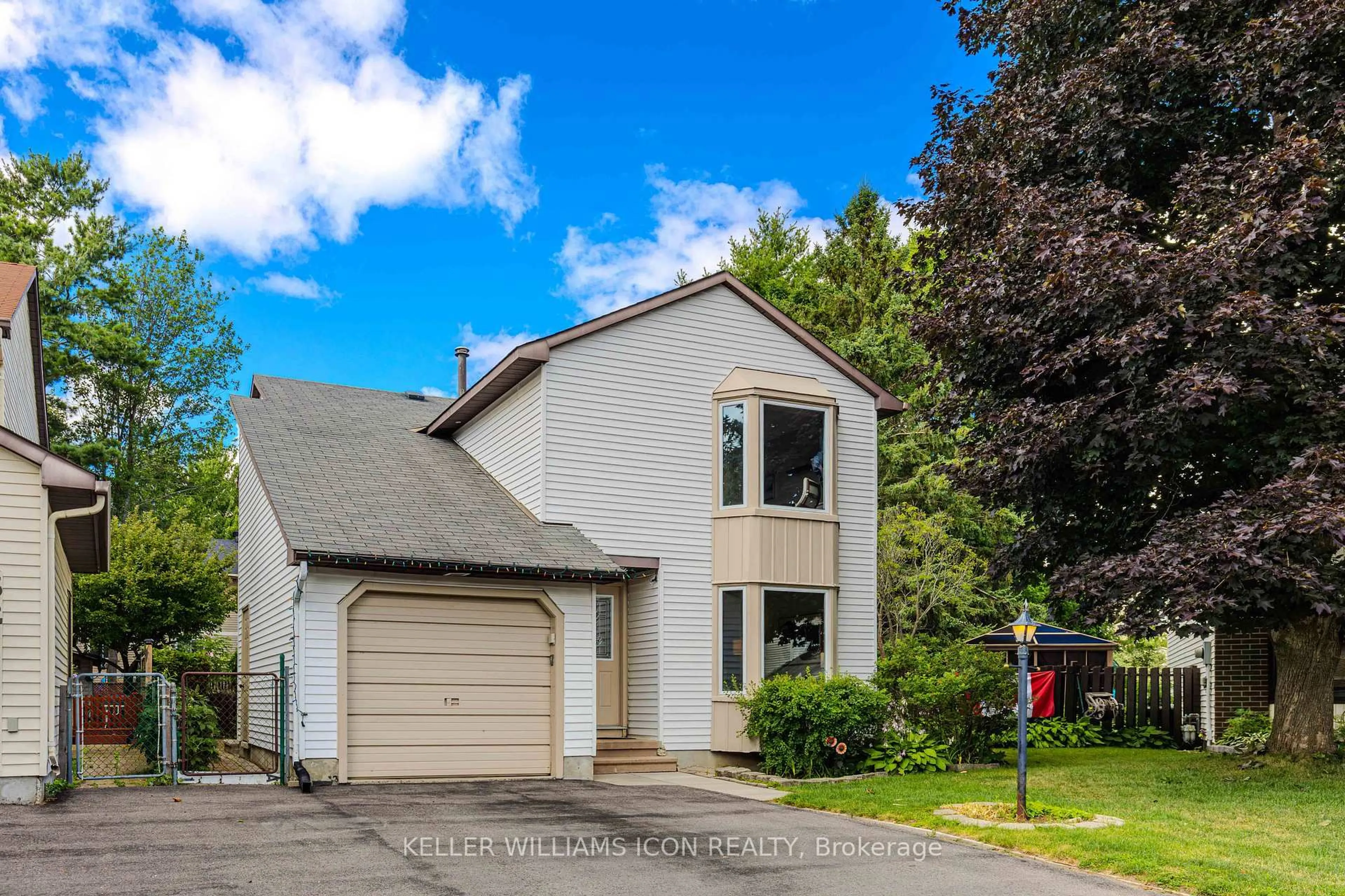 Home with vinyl exterior material, street for 30 Turret Crt, Ottawa Ontario K2L 2L1