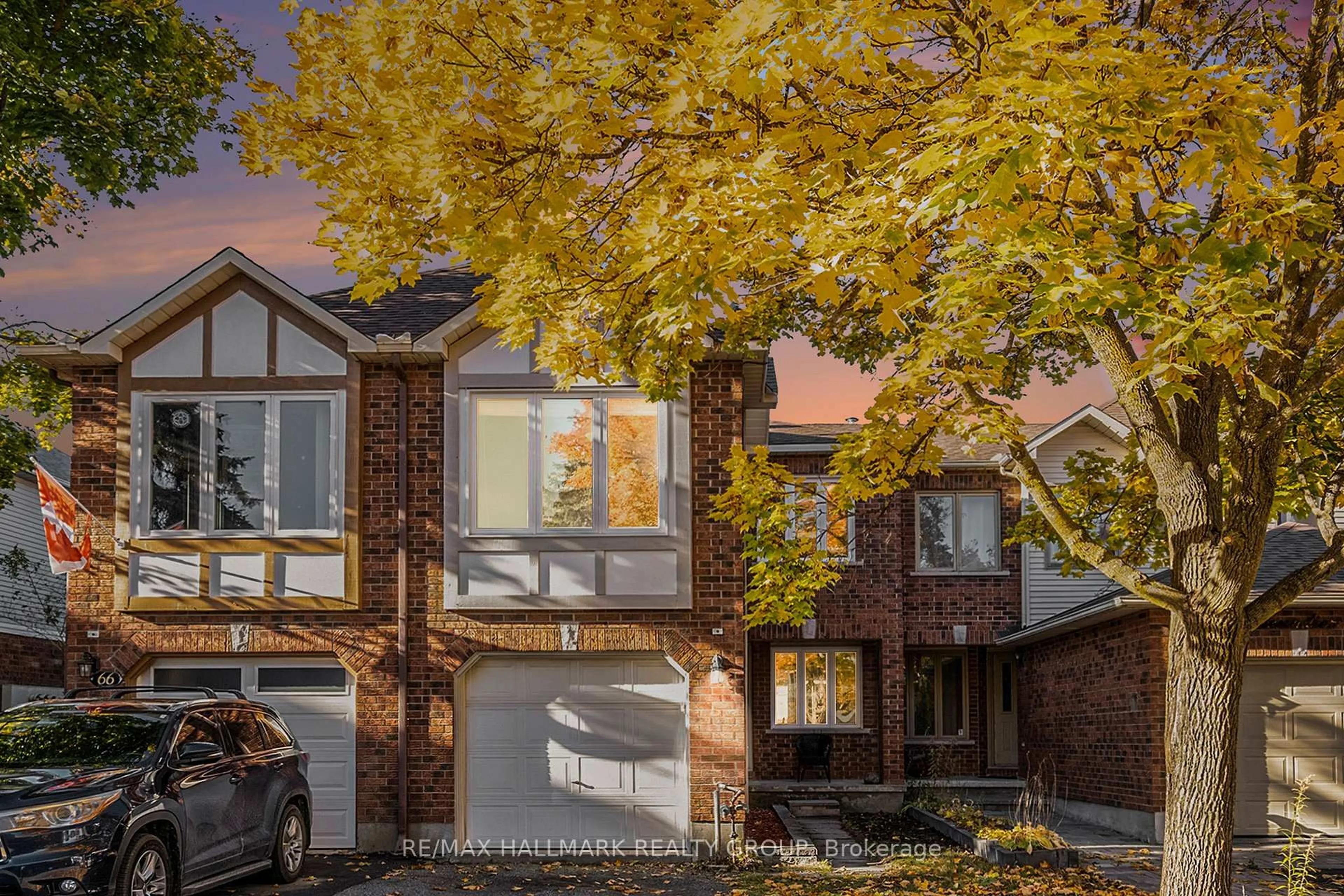 Home with brick exterior material, street for 64 Grenadier Way, Ottawa Ontario K2J 4L5