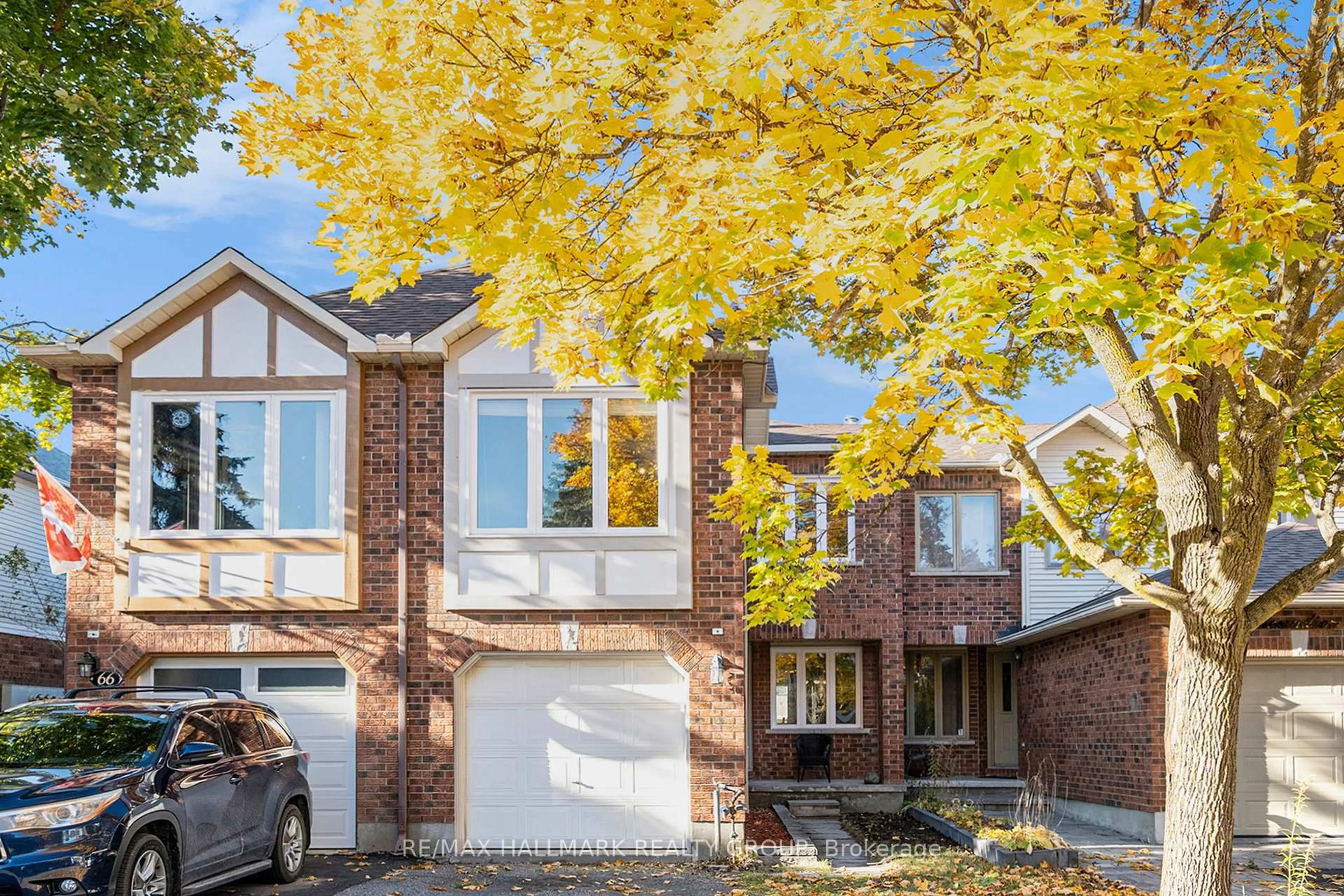 Home with brick exterior material, street for 64 Grenadier Way, Ottawa Ontario K2J 4L5